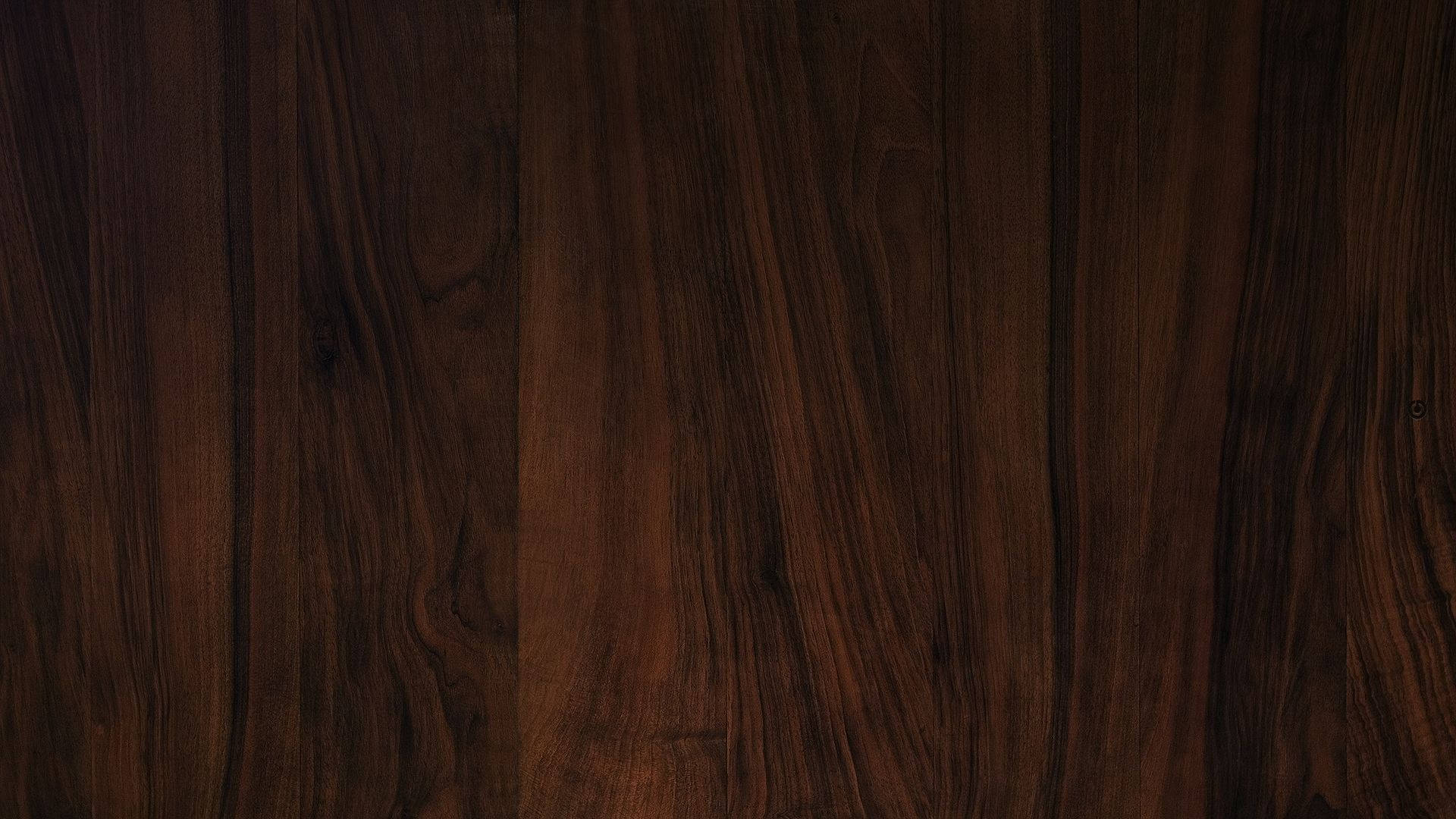 木紋 桌布 壁紙 — 豐富的深色木紋紋理，帶有深棕色色調和自然流動的圖案。