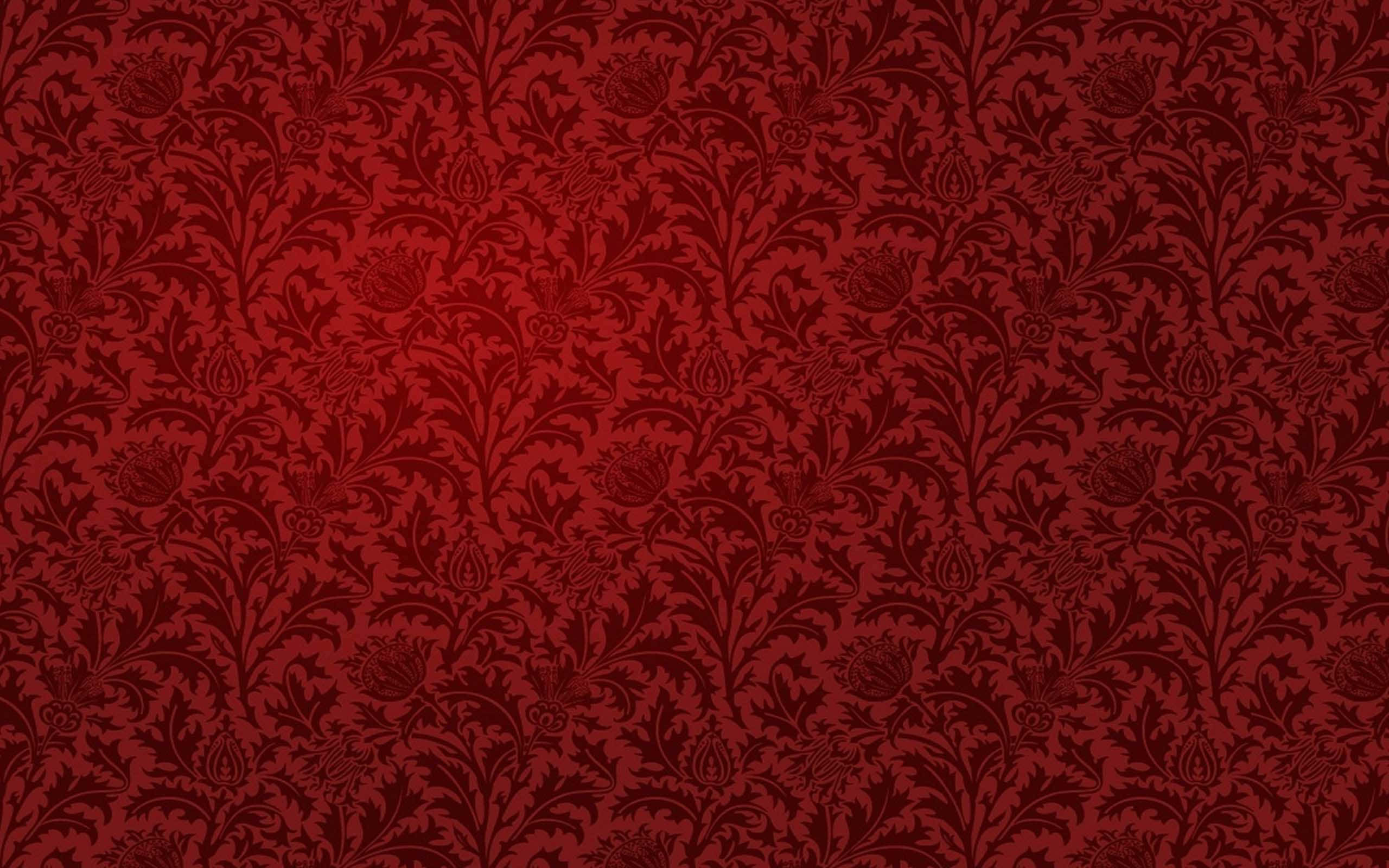 Floral Pattern 桌布 壁紙 — 豐富的紅色壁紙，帶有複雜的深色花卉錦緞圖案和微妙的漸變照明。