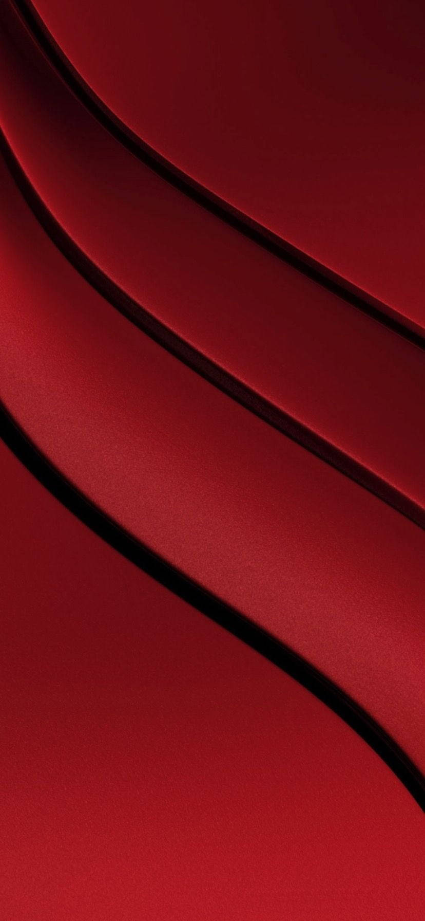 iPhone 桌布 壁紙 — 豐富的紅色布料褶皺在充滿活力的深紅色背景上營造出優雅的流動曲線和深邃陰影。