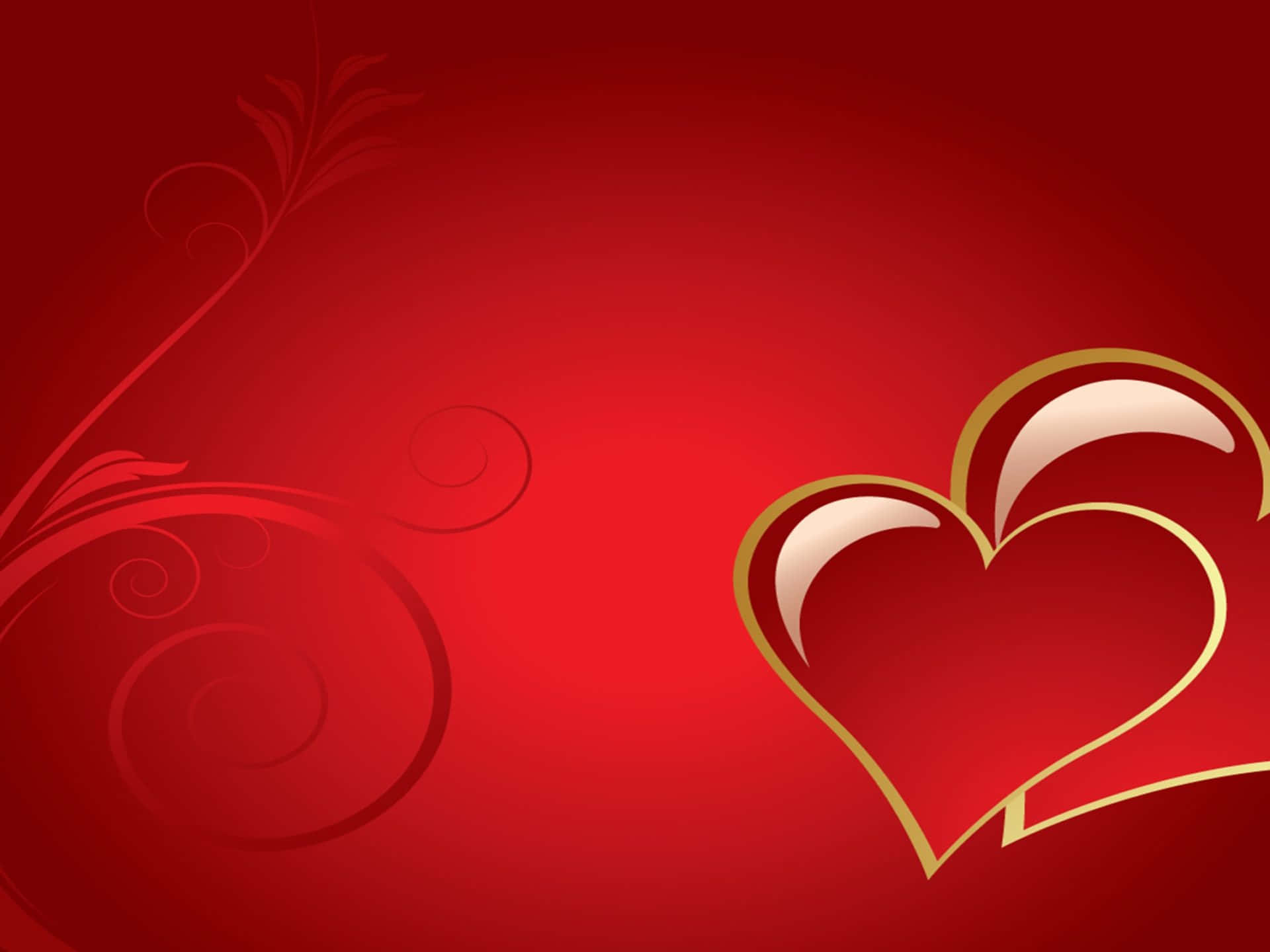 High Resolution Valentines Day 桌布 壁紙 — 豐富的紅色背景上有一個金色輪廓的心形，上方有一個較小的心形，左側有優雅的漩渦花卉圖案。