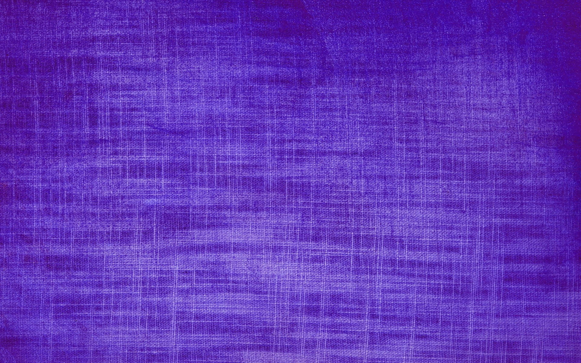 Purple Texture 桌布 壁紙 — 豐富的紫色紋理布料，帶有微妙的編織圖案和漸變陰影。