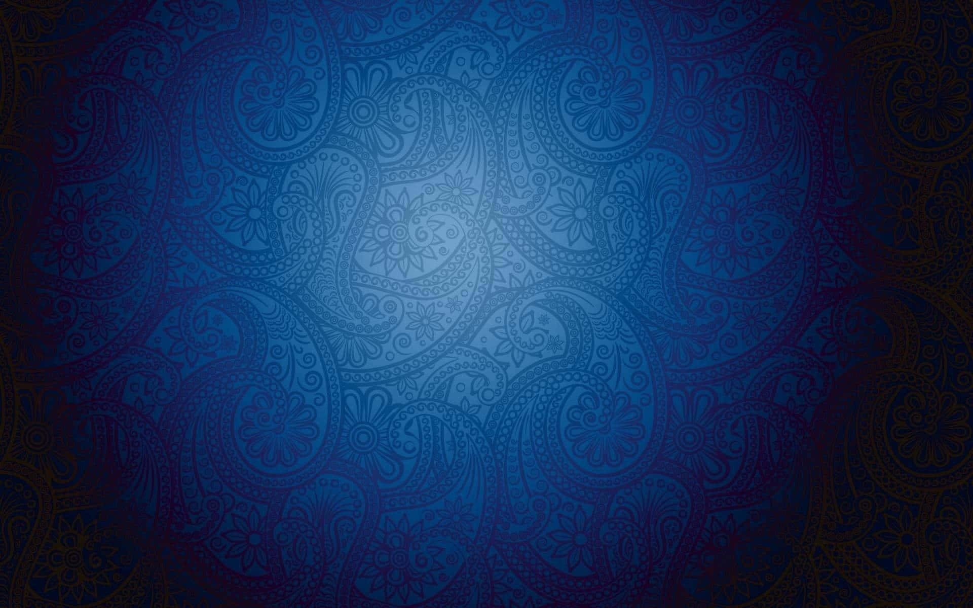 bandana 桌布 壁紙 — 豐富的藍色漸變壁紙，帶有複雜的佩斯利圖案，逐漸淡入較暗的角落。