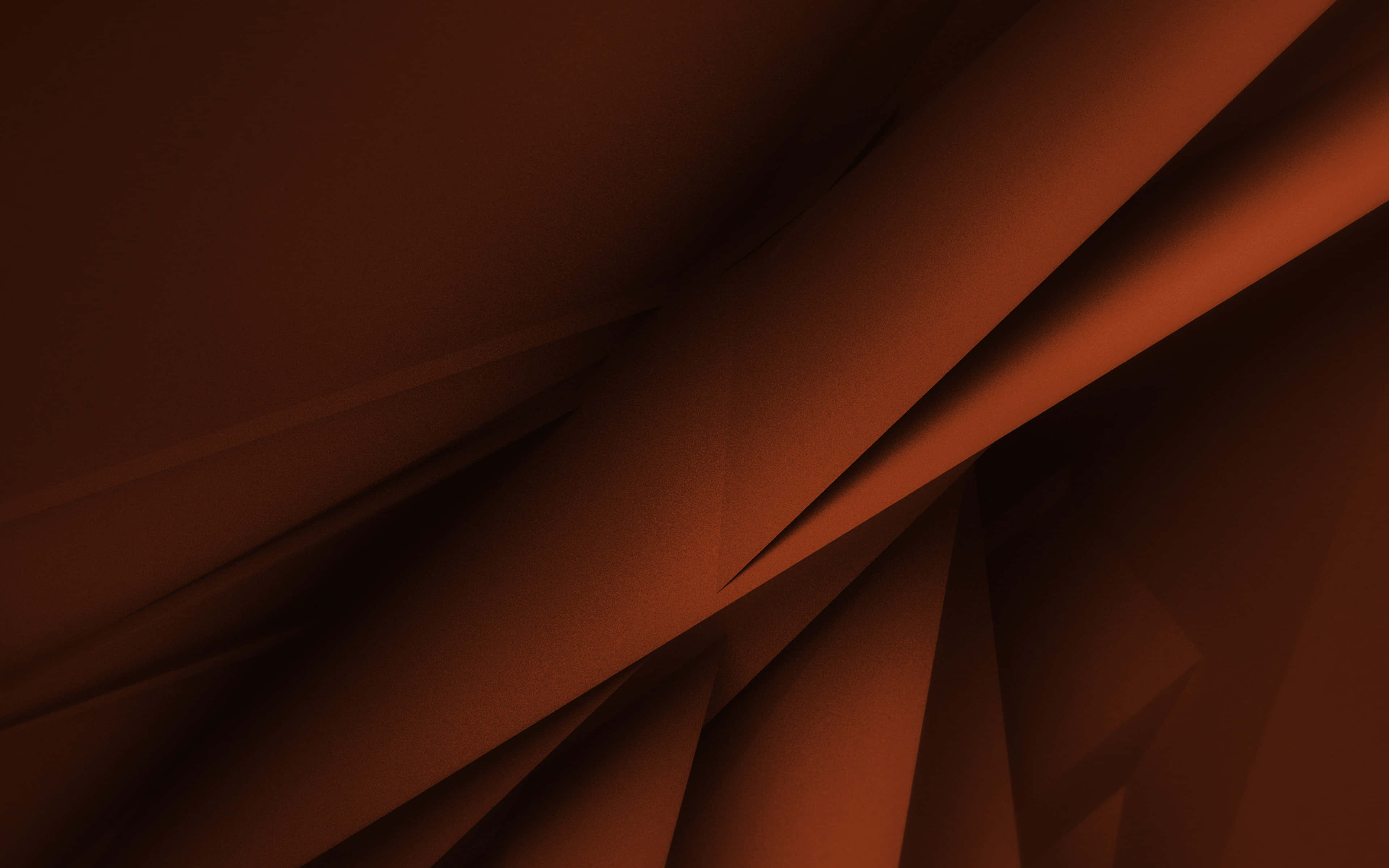 Brown Geometric 桌布 壁紙 — 豐富的鏽色和深棕色織物的抽象幾何褶皺，營造出帶有戲劇性陰影的紋理極簡構圖。