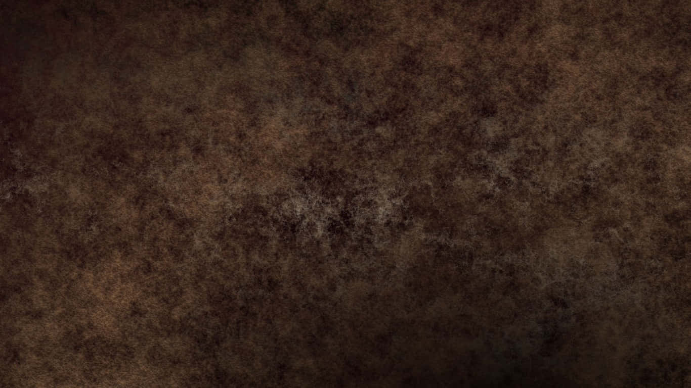 Brown Texture 桌布 壁紙 — 豐富紋理的棕色表面，帶有斑駁變化和微妙的淺色斑點，營造出復古垃圾風格效果。