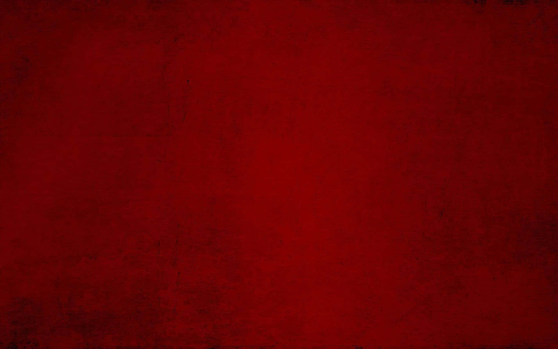 Red Texture 桌布 壁紙 — 豐富紋理的深紅色背景，帶有微妙的色調變化和輕微的表面瑕疵。