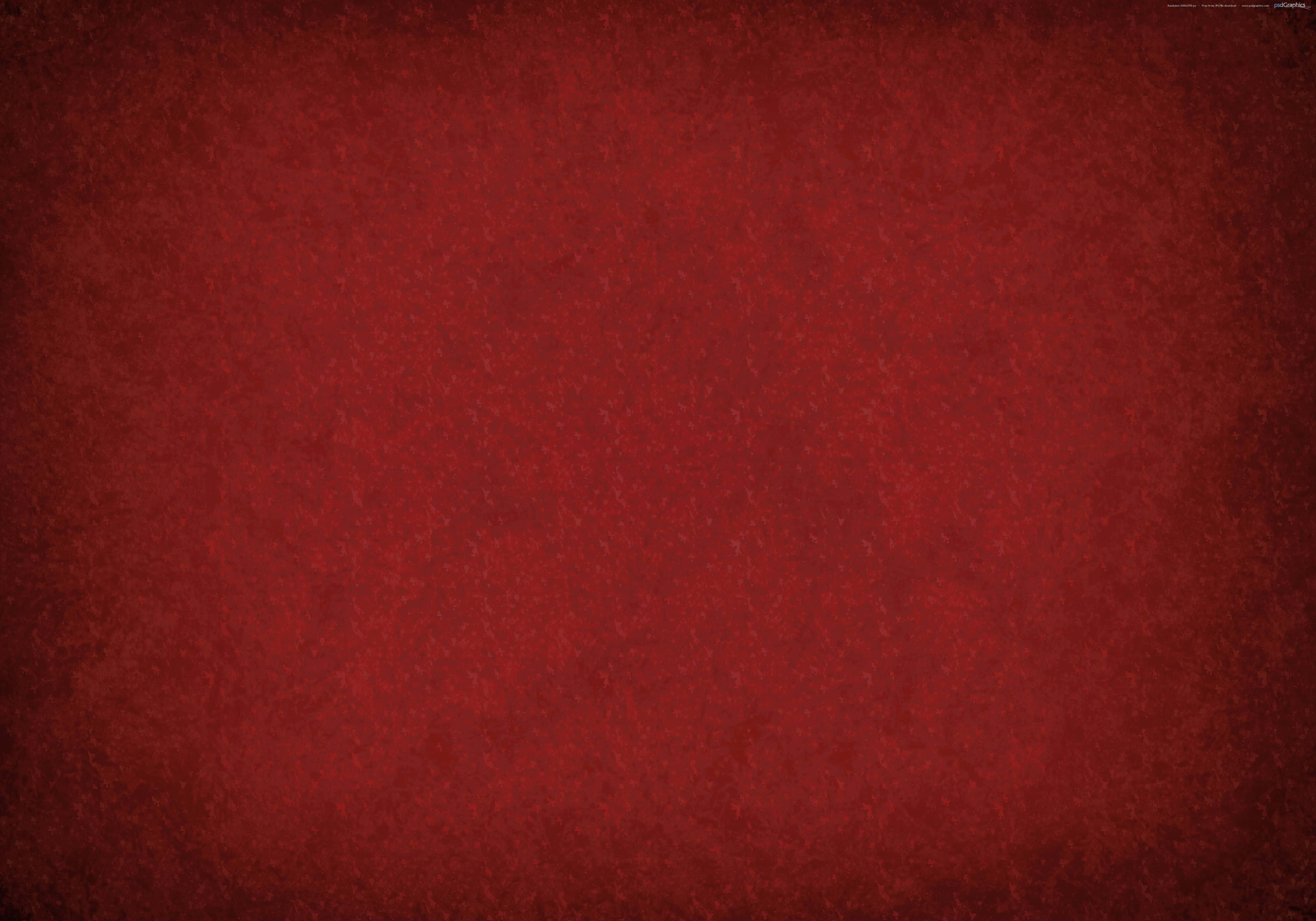 Red Grunge 桌布 壁紙 — 豐富紋理的深紅色背景，帶有微妙的色調變化和顆粒狀表面細節。