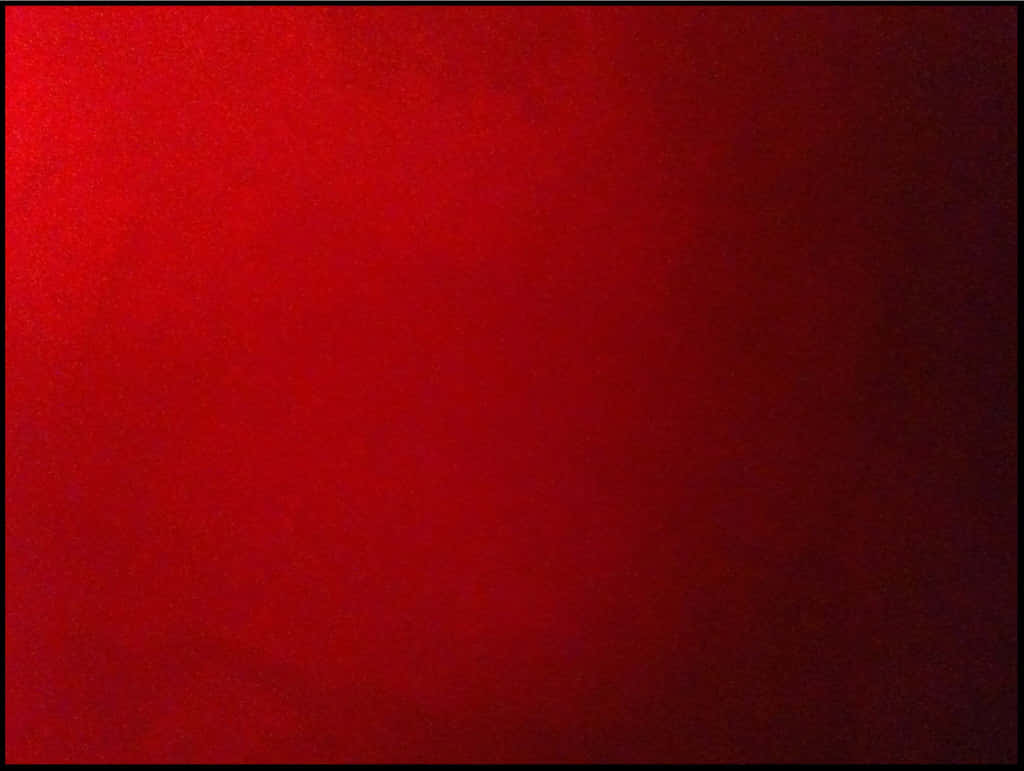 Red Ombre 桌布 壁紙 — 豐富紋理的紅色漸變背景，從亮紅褪色到深紅。