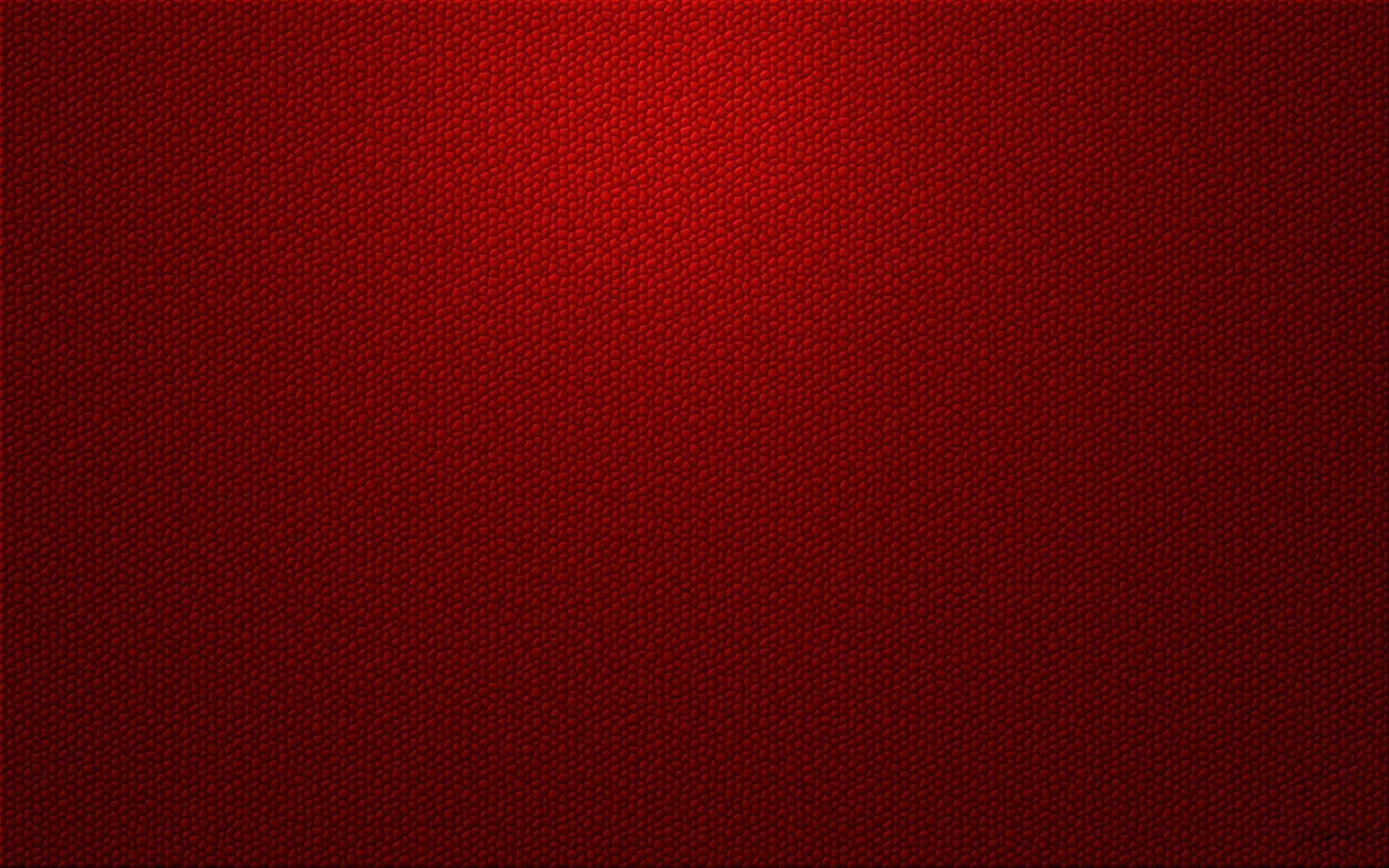 Red Texture 桌布 壁紙 — 豐富紋理的紅色表面，帶有微妙的漸變和精細的卵石圖案。