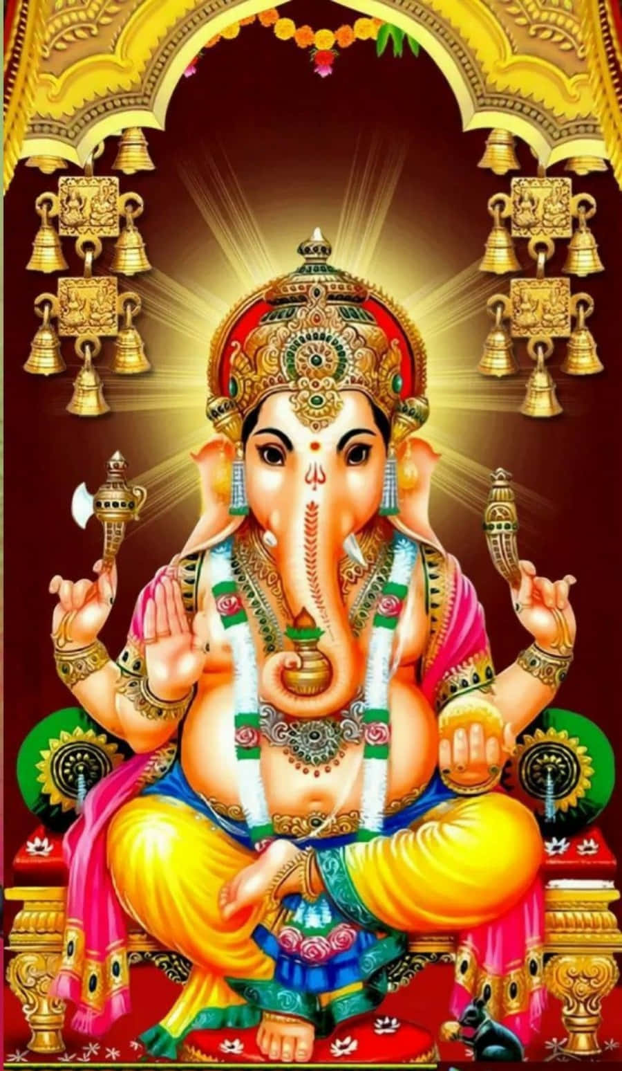 Indian God 桌布 壁紙 — 象頭神莊嚴地坐在裝飾著金鈴和花環的寶座上，散發著神聖的光芒。