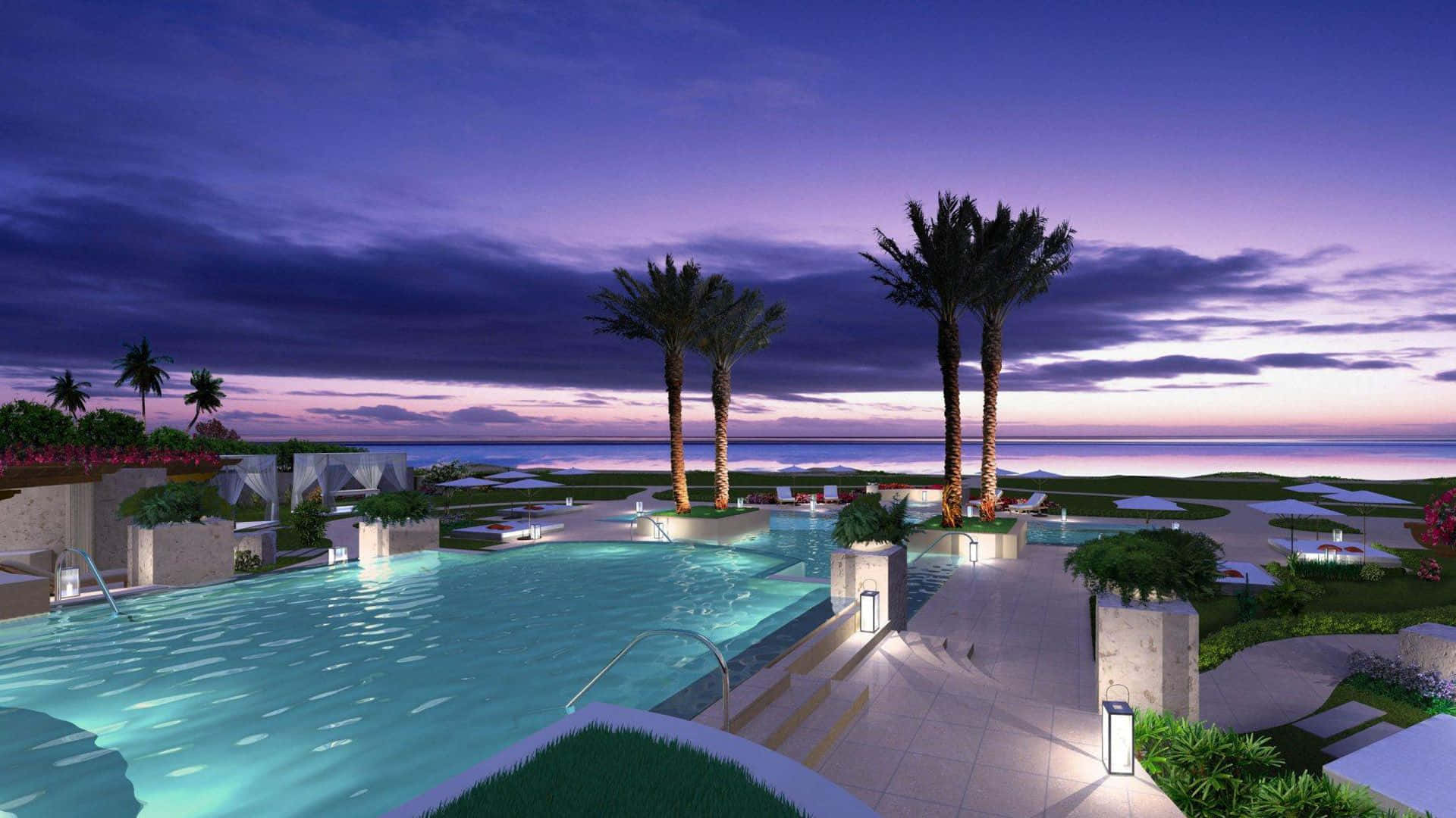 Beach Resort 桌布 壁紙 — 豪華度假村泳池在暮色天空下閃耀，棕櫚樹在海平線旁搖曳。