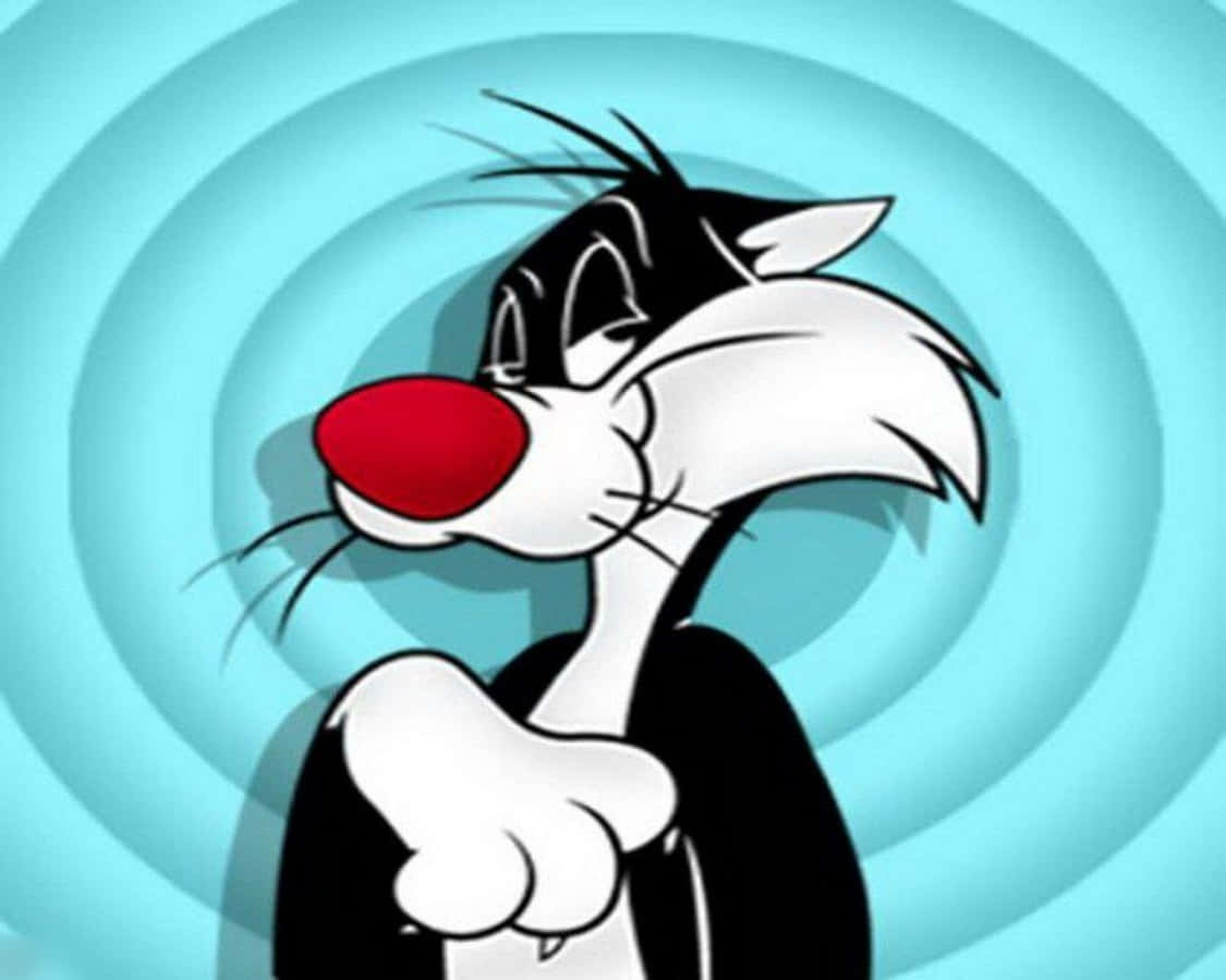 Sylvester The Cat 桌布 壁紙 — 貓咪 Sylvester 自信地指向旋轉的青綠色背景，採用經典卡通風格。