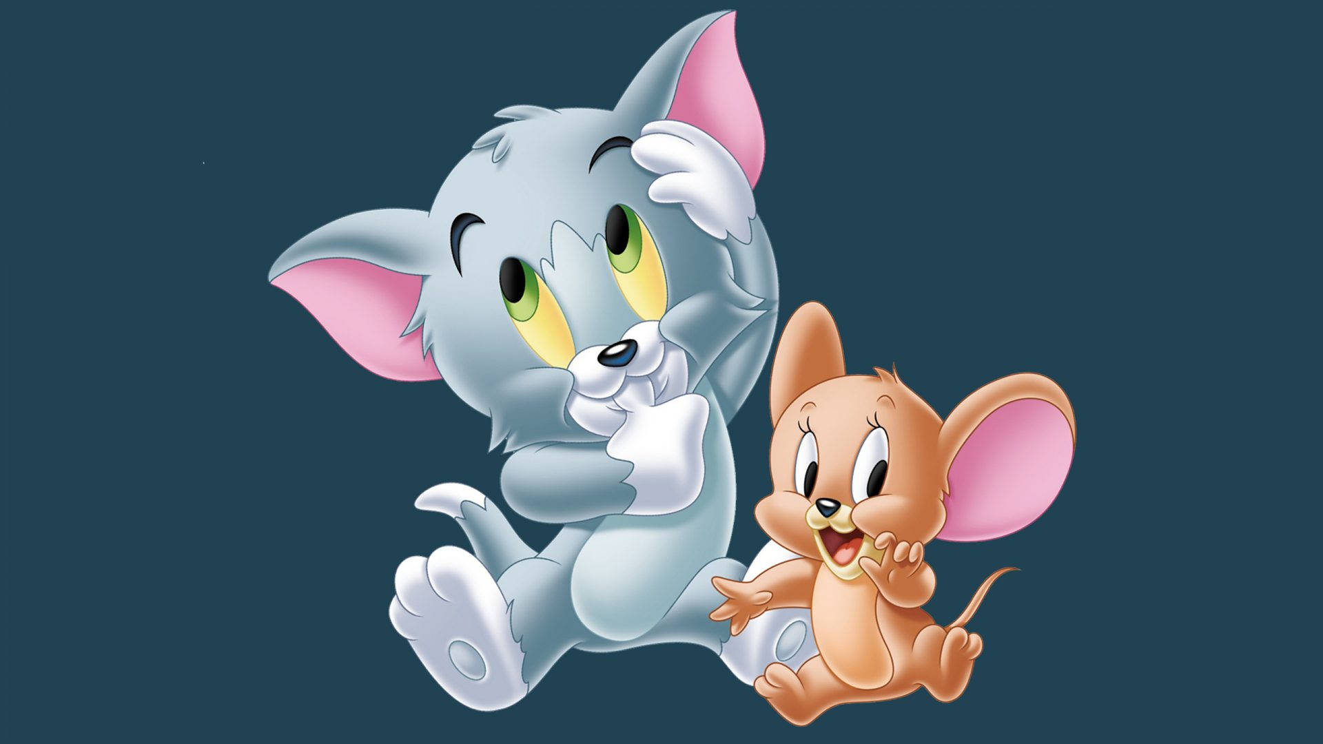 Jerry 桌布 壁紙 — 貓湯姆和老鼠傑瑞在深藍綠色背景上嬉戲追逐。