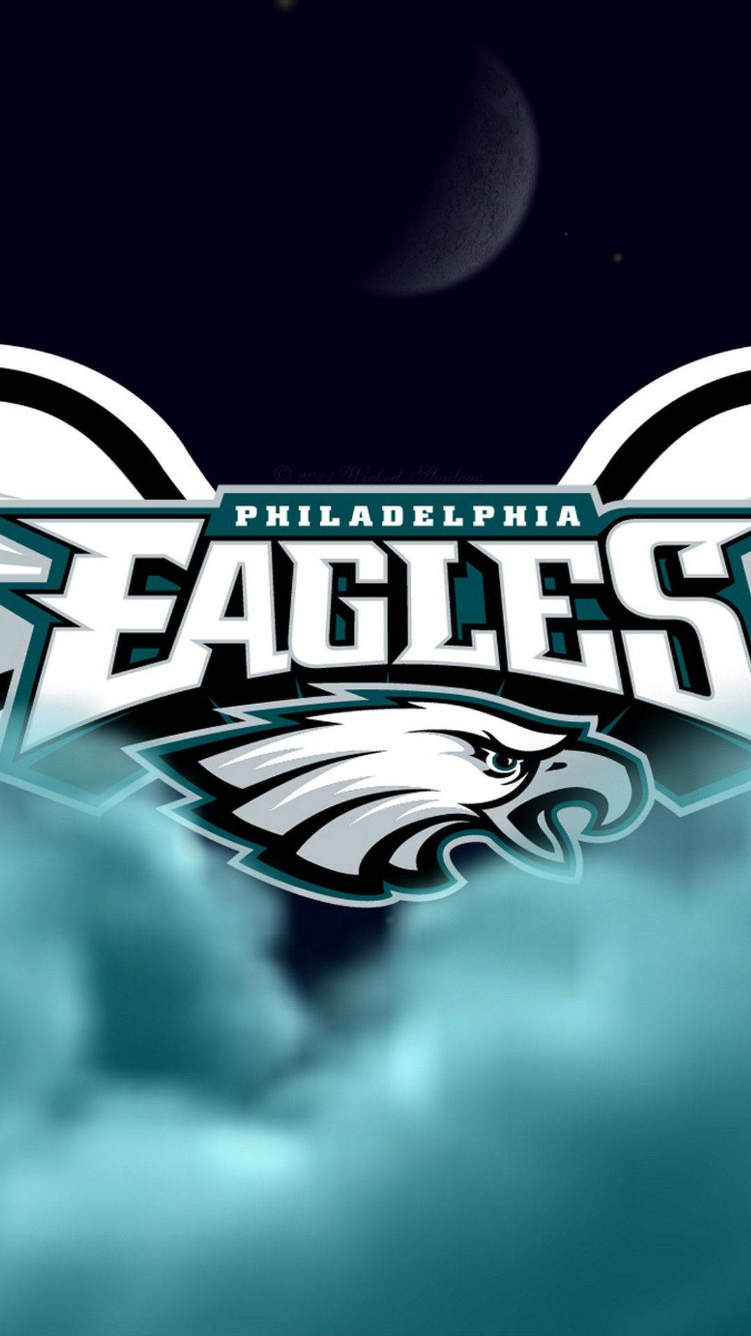 費城老鷹 桌布 壁紙 — 費城老鷹隊標誌在黑暗的天空中閃耀，伴隨著新月和青綠色的雲彩。
