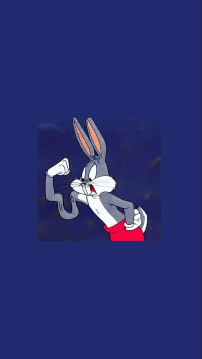 Bugs Bunny Supreme 桌布 壁紙 — 賓尼兔在深藍色背景前彎曲二頭肌，露出頑皮的笑容。