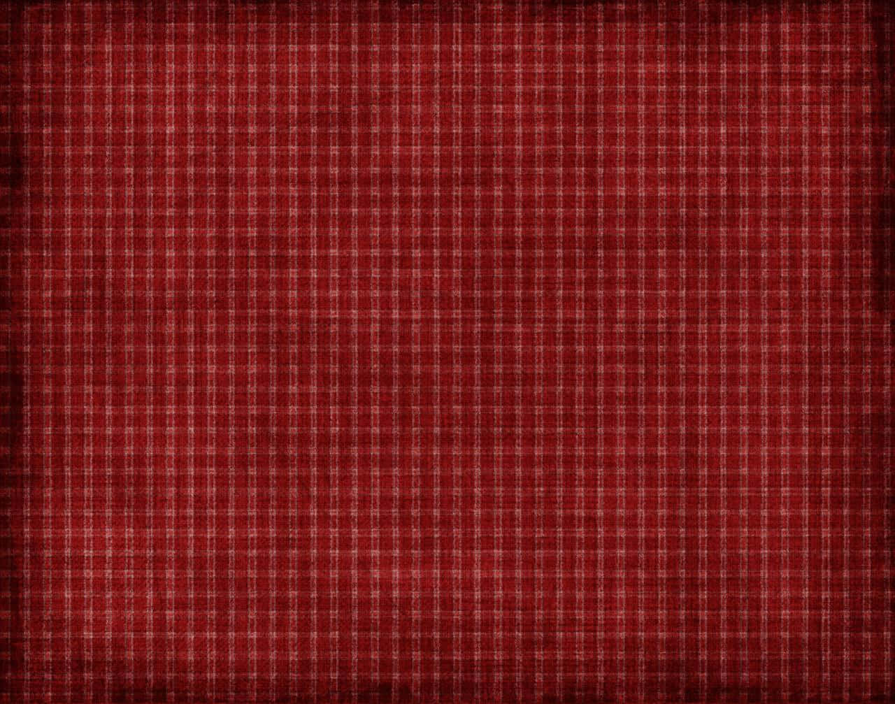 Plaid 桌布 壁紙 — 質感細膩、邊緣褪色的濃郁紅色格子布料，營造出溫暖質樸的背景。