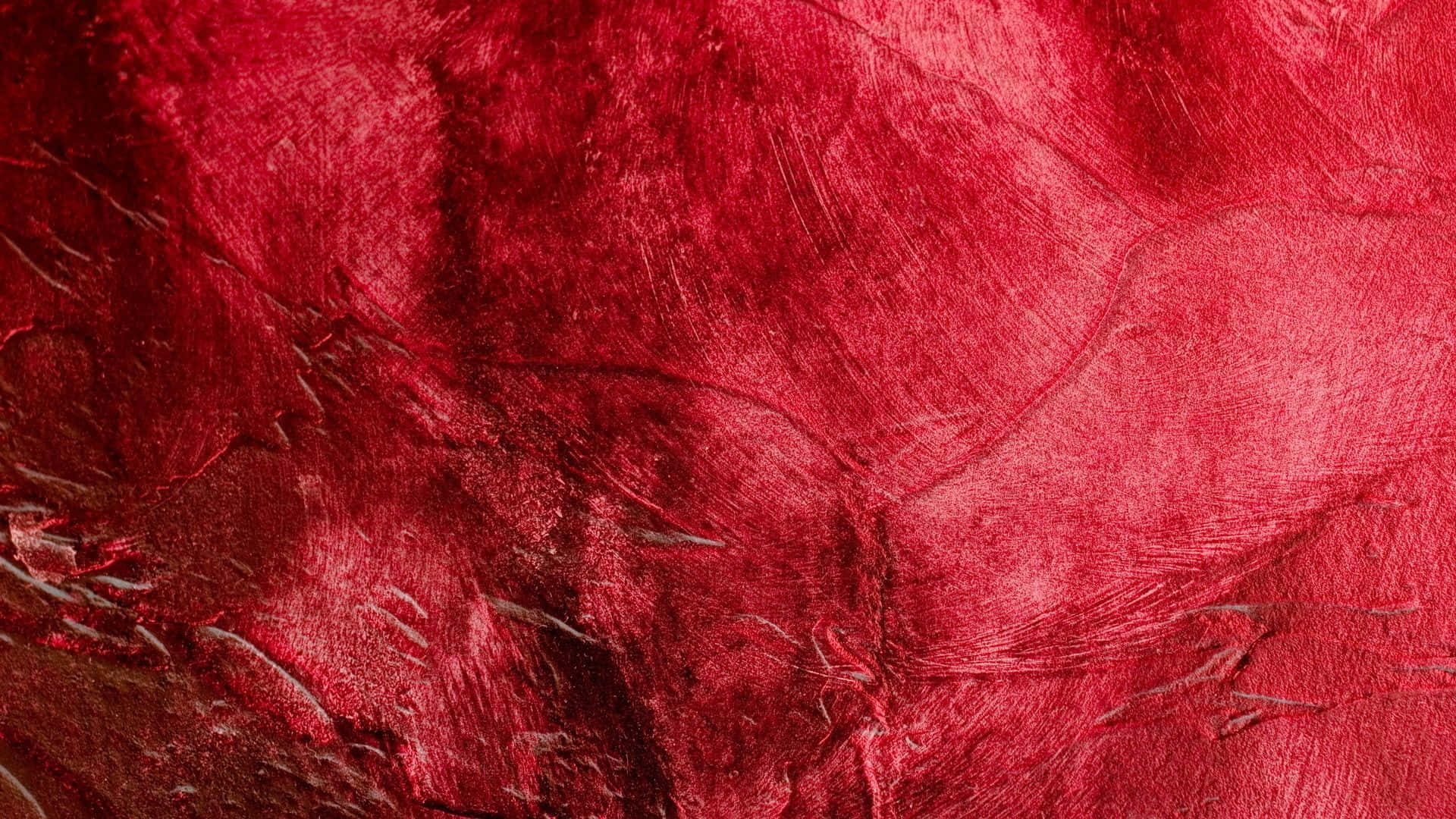 Red Texture 桌布 壁紙 — 質感豐富的深紅色布料，在柔和光線下呈現深摺痕和細微光澤。
