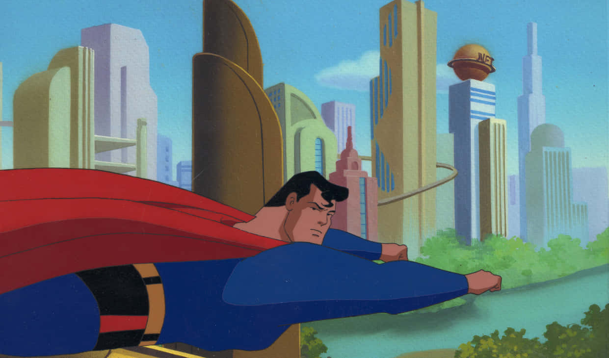Superman The Animated Series 桌布 壁紙 — 超人在晴朗藍天背景下，於風格化城市景觀上空翱翔，紅色斗篷在他身後飄揚。