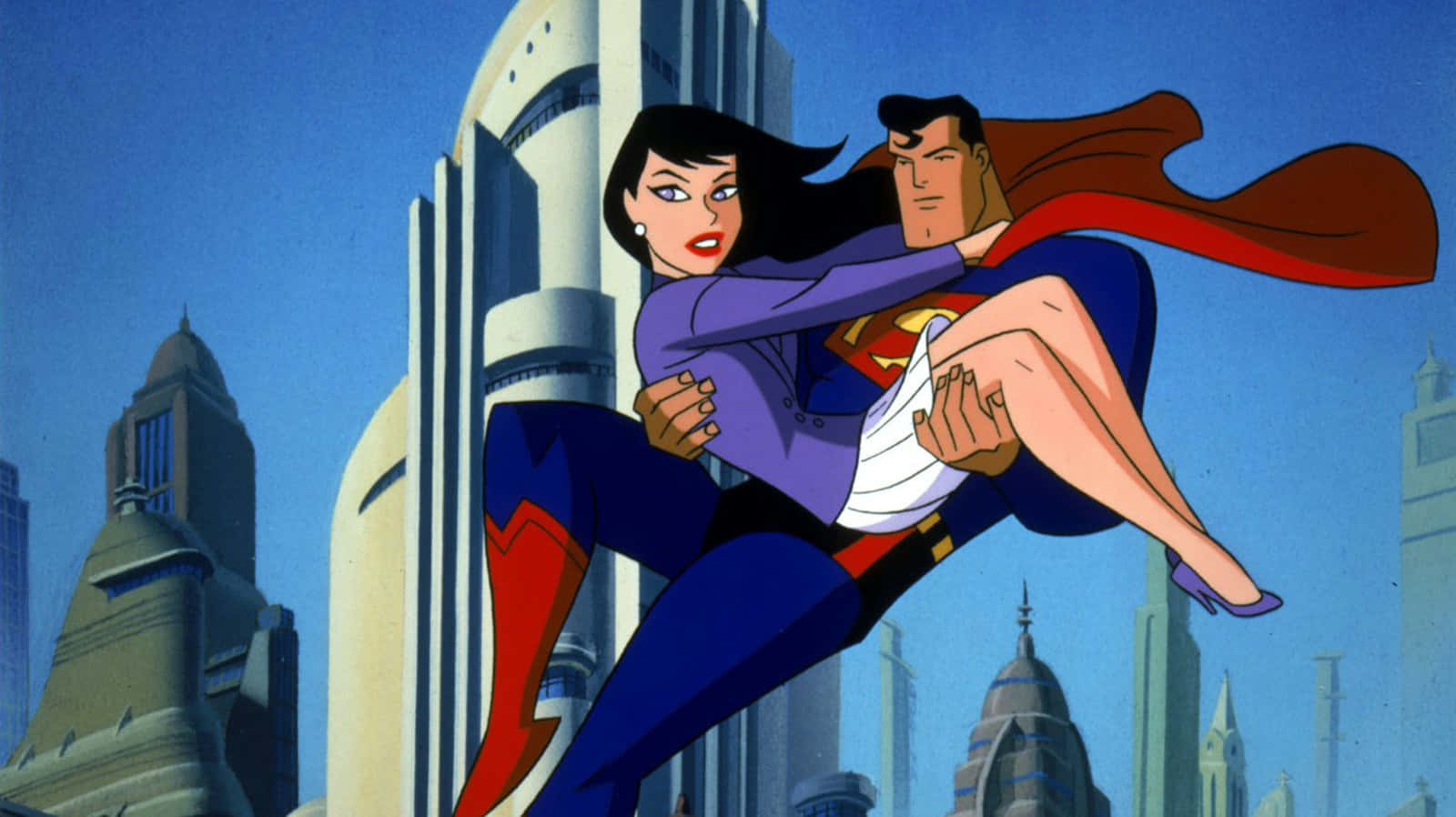 Superman The Animated Series 桌布 壁紙 — 超人帶著超級少女飛過未來城市景觀，高聳的摩天大樓在清澈的藍天下。