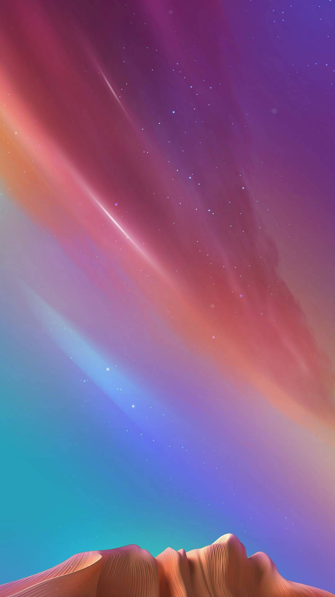 iOS 15 桌布 壁紙 — 超現實的沙漠峽谷山峰，在充滿活力的宇宙天空下，天空佈滿粉紅色、紫色和藍色的極光以及閃爍的星星。