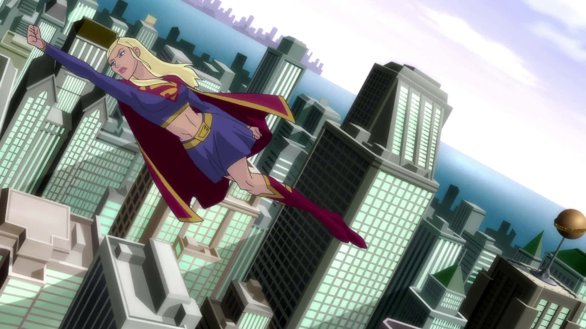 Superman Unbound 桌布 壁紙 — 超級女孩翱翔於廣闊的城市景觀之上，摩天大樓伸向明亮的天空。