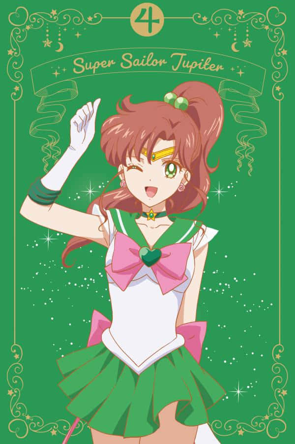 sailor jupiter 桌布 壁紙 — 超級水手木星身穿綠色和白色的水手服，在閃爍的綠色背景上，帶有金色裝飾邊框，露出燦爛的笑容。