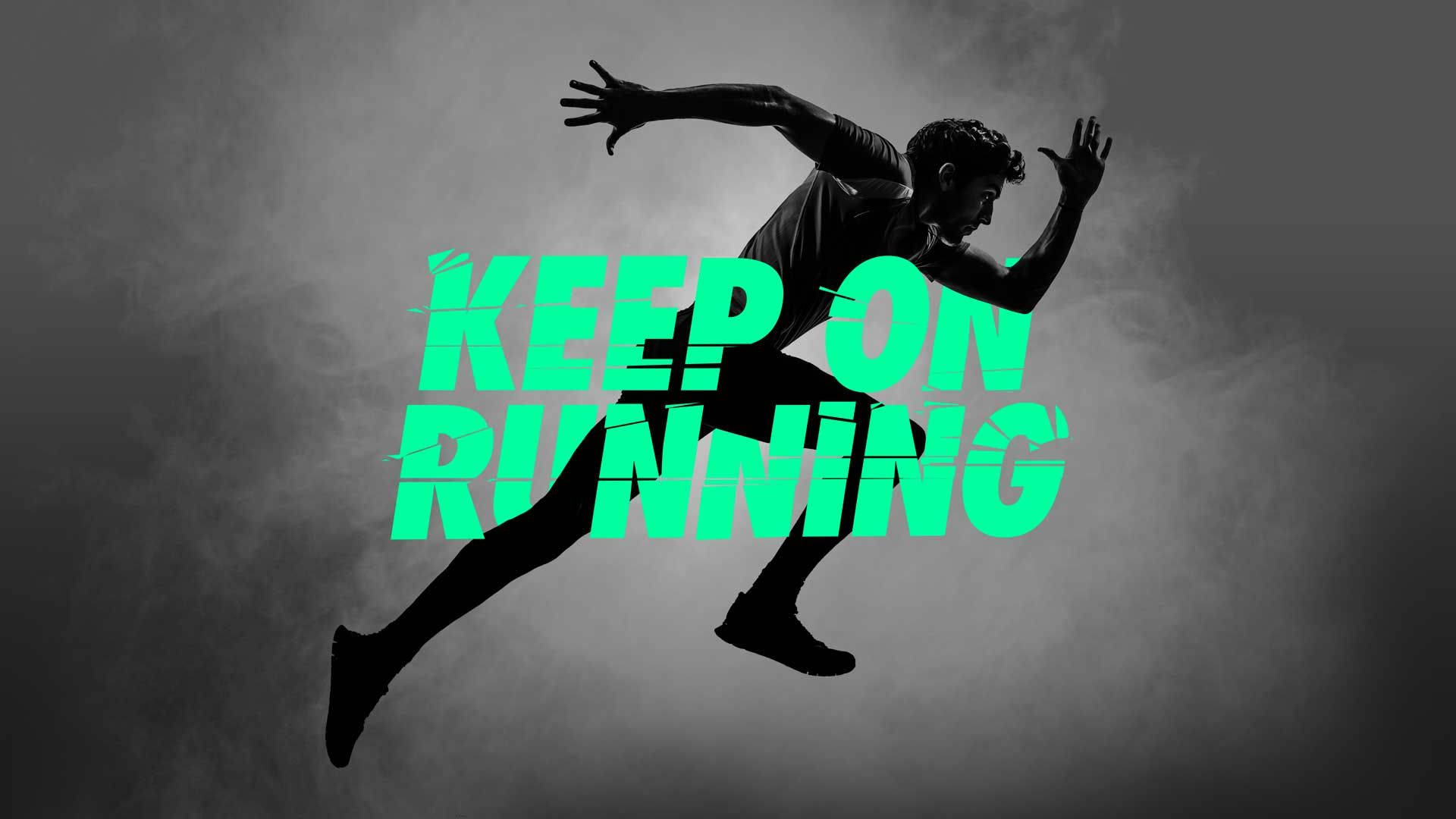 Running 桌布 壁紙 — 跑者半空中步態的剪影，襯以煙灰色背景，並有粗體綠色文字寫著 keep on running。