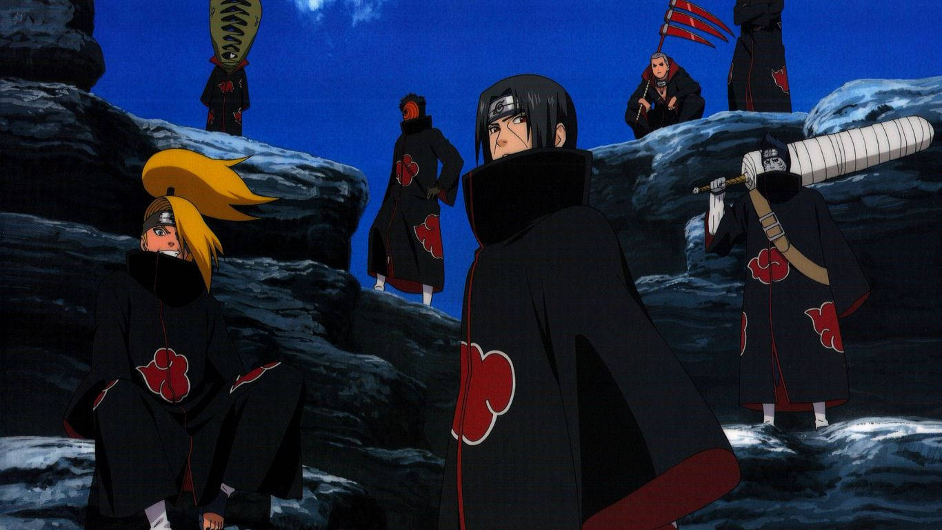 Itachi And Kisame 桌布 壁紙 — 身穿帶有紅色雲紋的黑色斗篷的動漫角色，站在深藍色夜空下的岩石懸崖上。