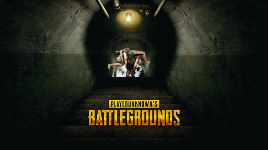 pubg 4K gaming 桌布 壁紙 — 身穿戰術裝備的玩家沿著昏暗的混凝土隧道向下，走向下方帶有PUBG標誌的發光出口。