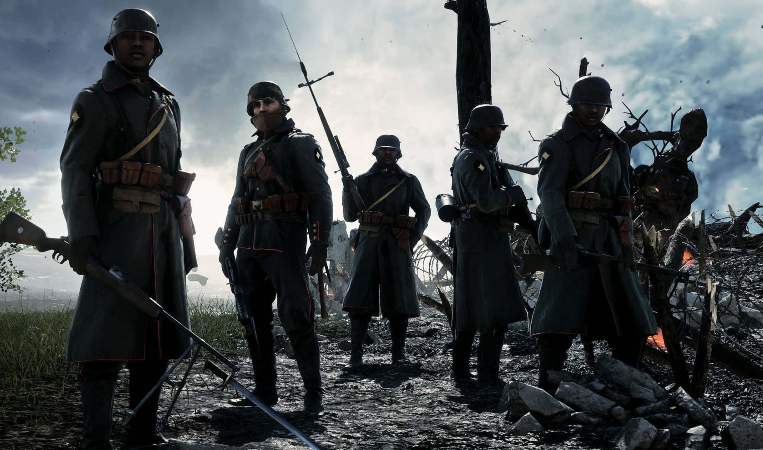 2440x1440 Battlefield 1 桌布 壁紙 — 身穿深色制服的士兵在陰天天空下莊嚴地站在戰場廢墟中。