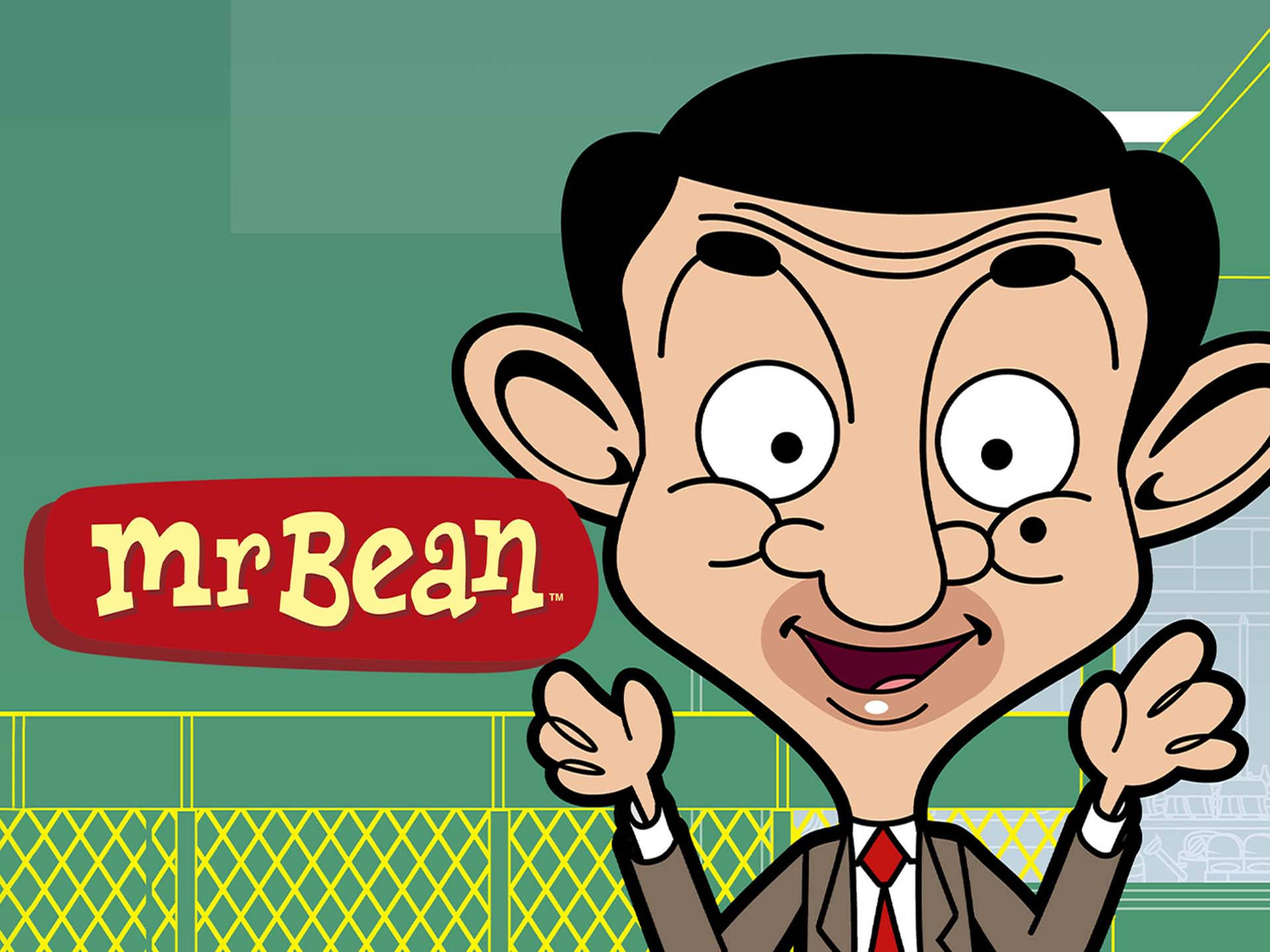 豆豆先生 桌布 壁紙 — 身穿西裝的Mr Bean卡通角色在綠色背景、黃色圍欄和標誌前愉快地揮手。
