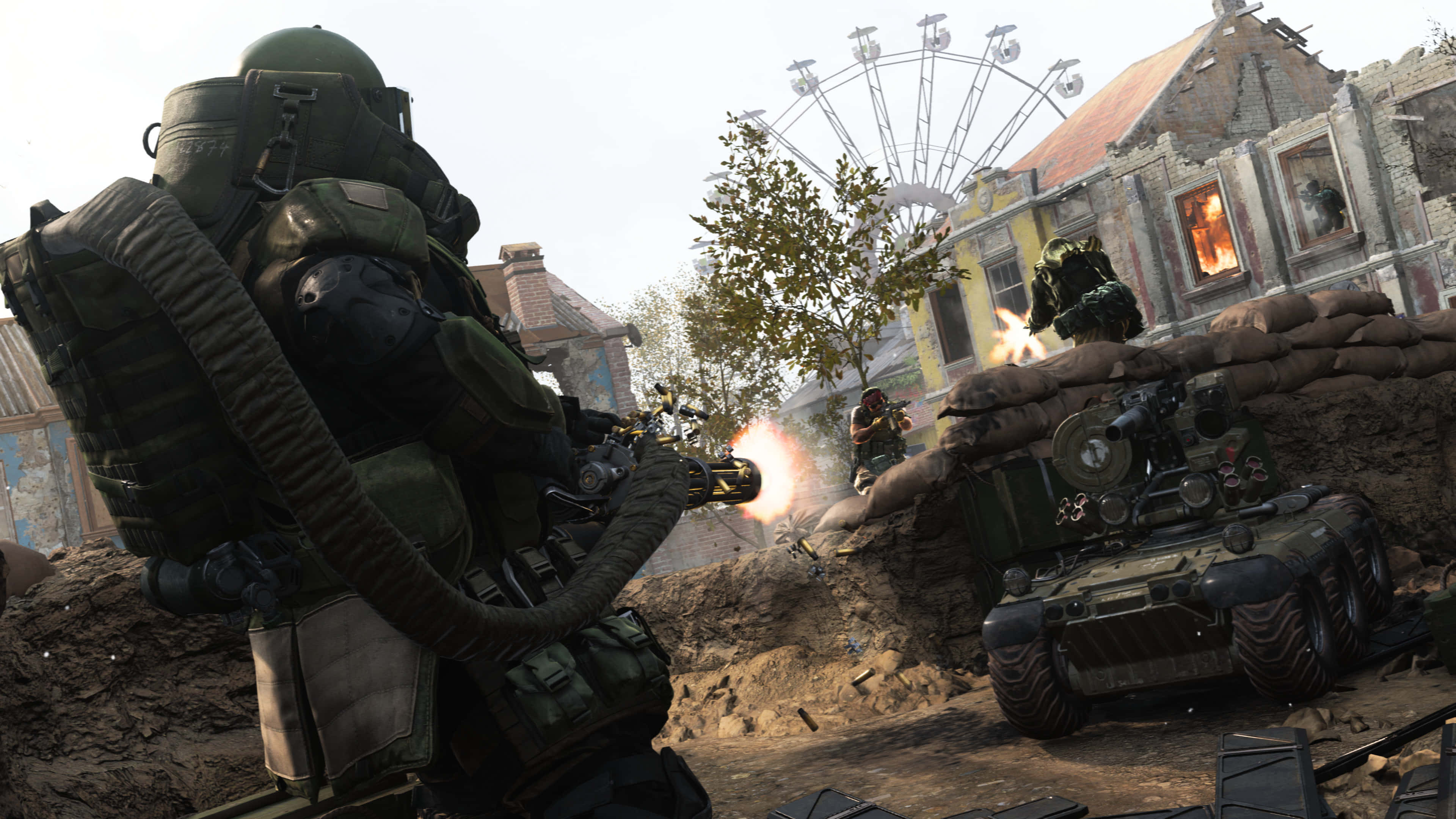 4K Call Of Duty Modern Warfare 桌布 壁紙 — 身穿重型裝備的士兵在瓦礫中開火，背景是燃燒的建築物和損壞的摩天輪。