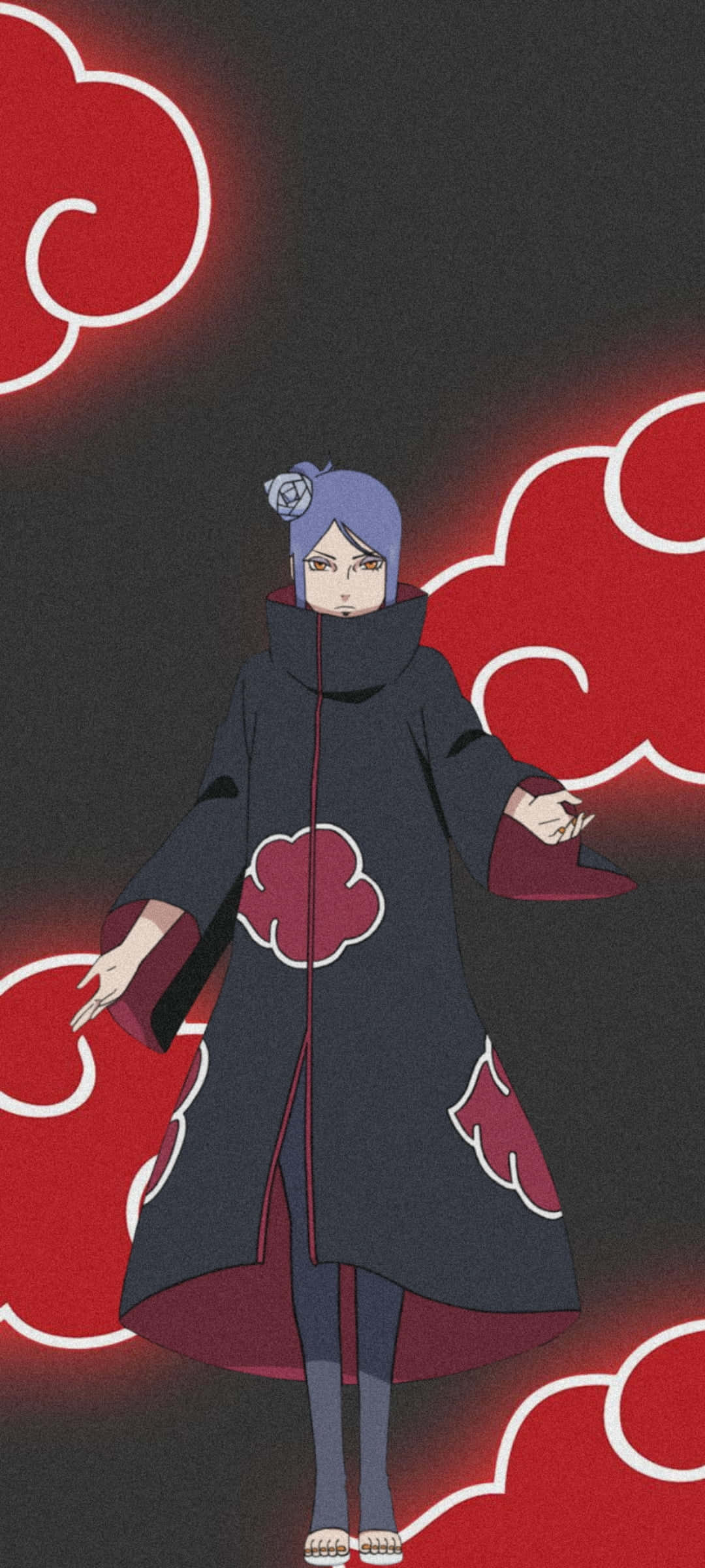 Konan 桌布 壁紙 — 身穿黑色斗篷、帶有紅色雲紋的動漫角色站在發光的紅色雲背景前。