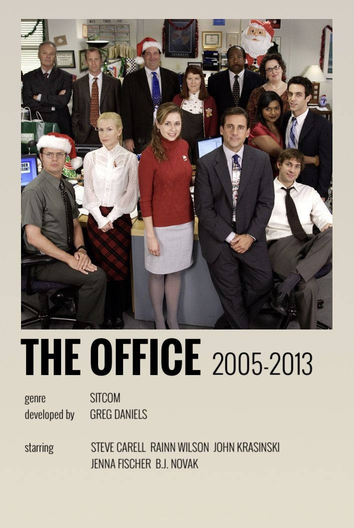 the office christmas 桌布 壁紙 — 《辦公室》演員戴上聖誕帽，在裝飾過的辦公室裡愉快地擺姿勢，迎接節日季節。