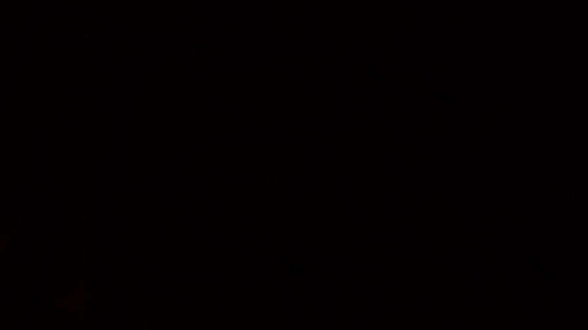 Vantablack 桌布 壁紙 — 近乎黑色的背景，表面散佈著微弱的紅褐色斑點。