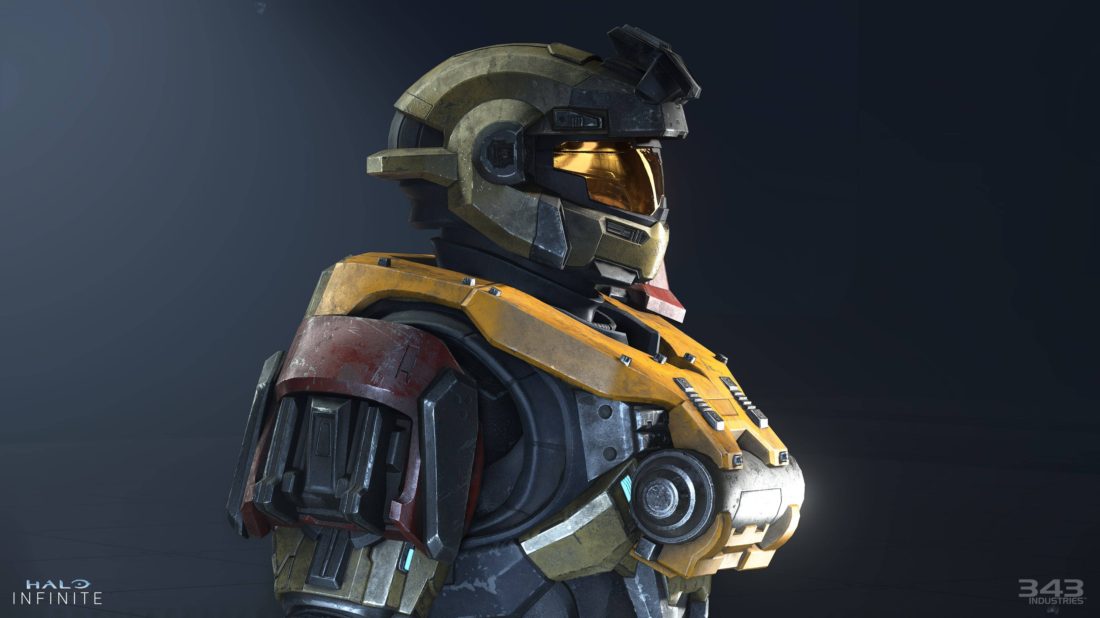 4K halo 桌布 壁紙 — 近距離拍攝一名身穿金黑色盔甲、戴著發光面罩的斯巴達戰士，背景為深色。