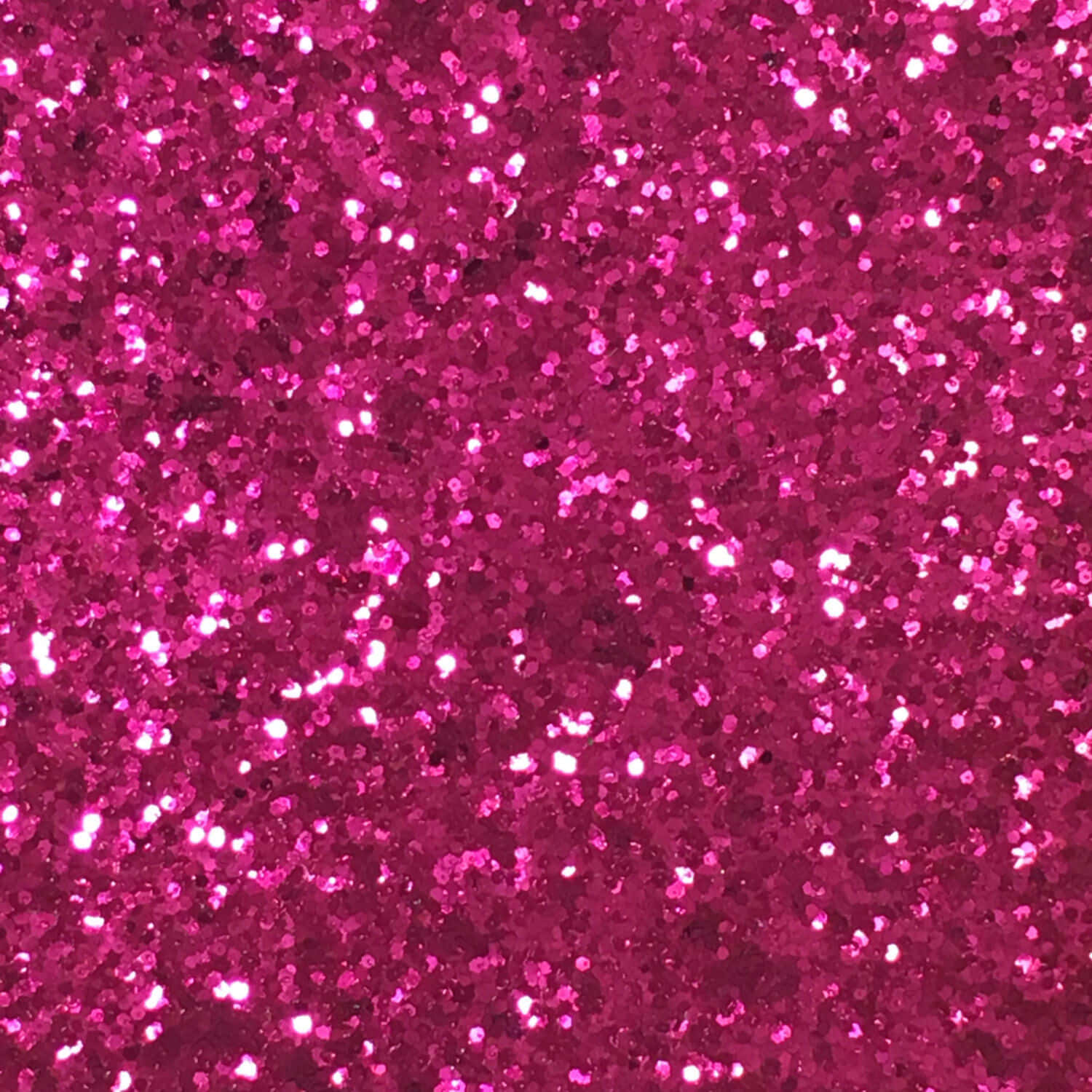Hot Pink Glitter 桌布 壁紙 — 近距離拍攝充滿活力的洋紅色閃粉，帶有捕捉光線的閃爍亮點。