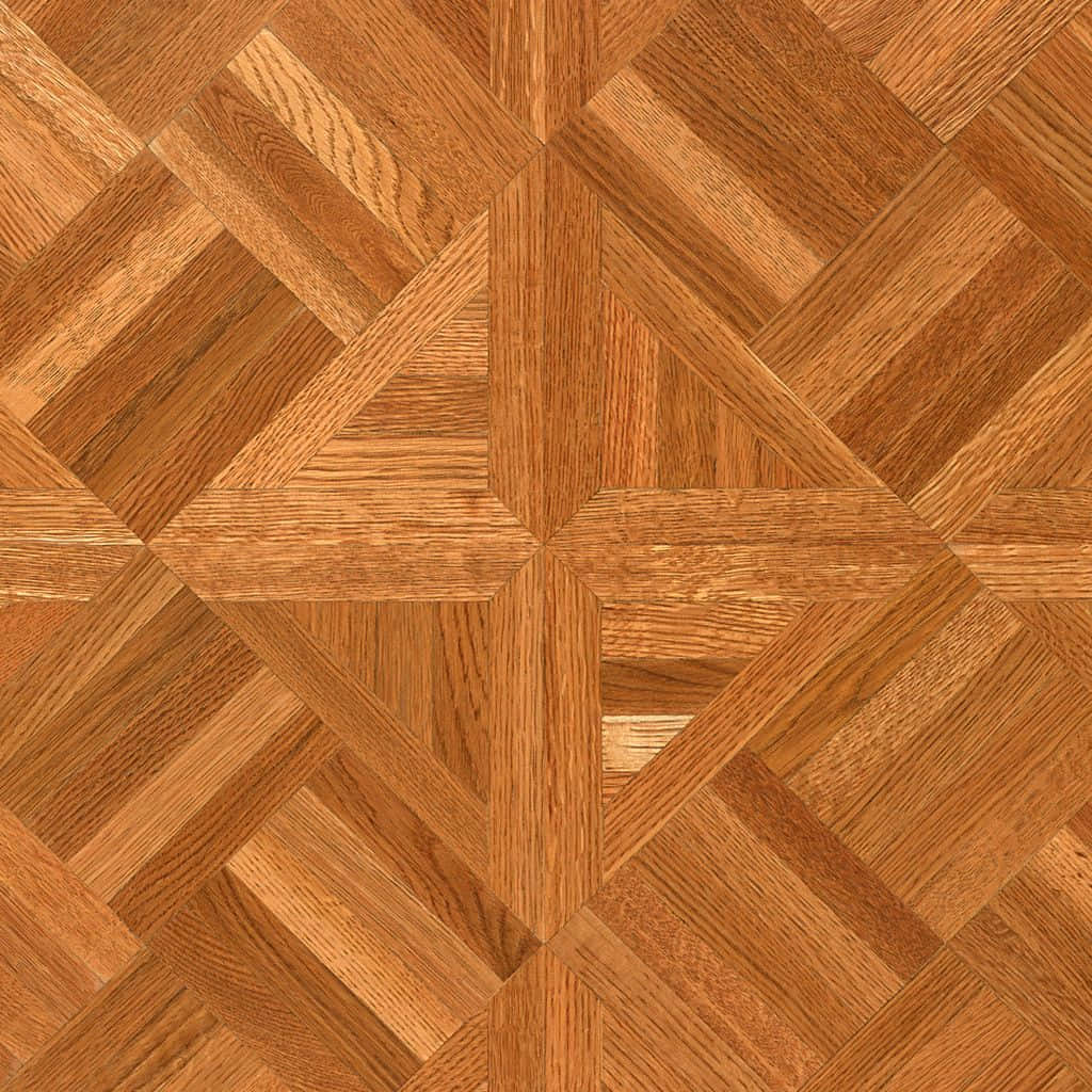 Floor 桌布 壁紙 — 近距離拍攝的紋理豐富的人字紋鑲木地板，帶有溫暖的琥珀色和蜂蜜色調。