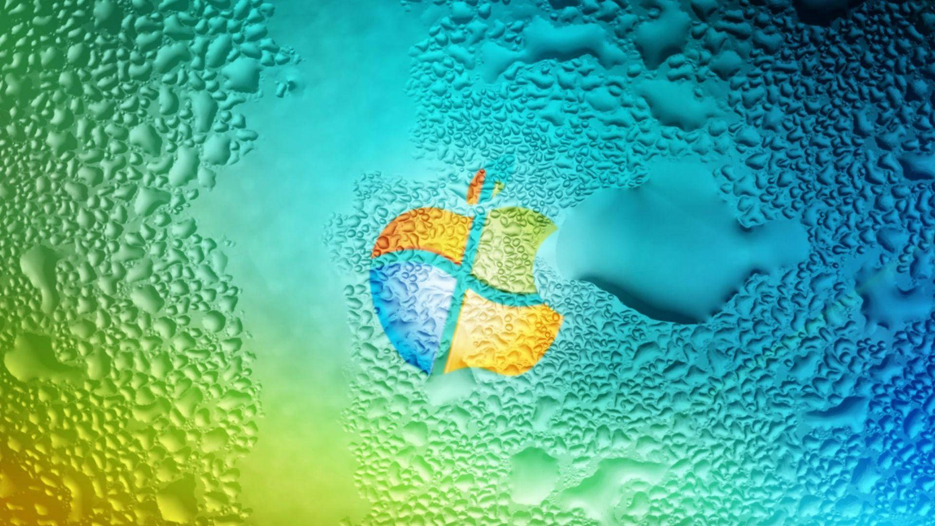 Windows Computer 桌布 壁紙 — 透過帶有紋理的玻璃表面（覆蓋著彩色水滴和冷凝水）看到的Windows標誌。