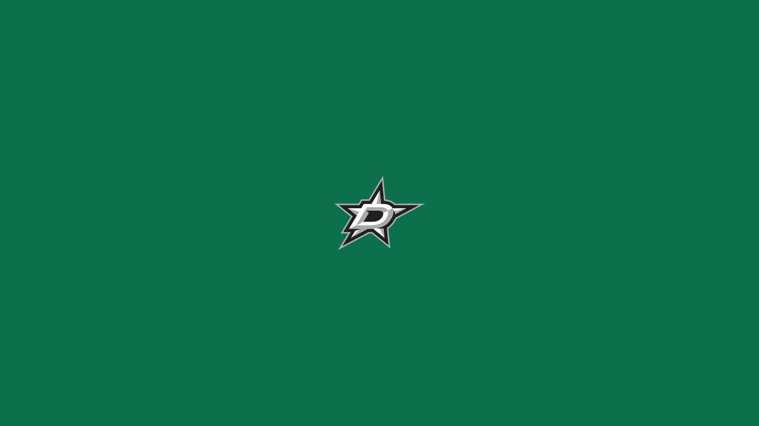 Dallas Stars 桌布 壁紙 — 達拉斯星隊標誌居中於純綠色背景上，帶有銳利的金屬星形設計。