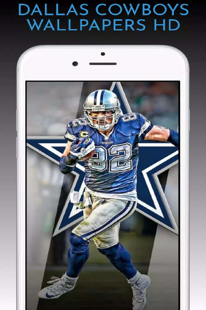 Dallas Cowboys Players 桌布 壁紙 — 達拉斯牛仔隊32號藍色制服足球運動員在星星標誌背景下帶球奔跑。