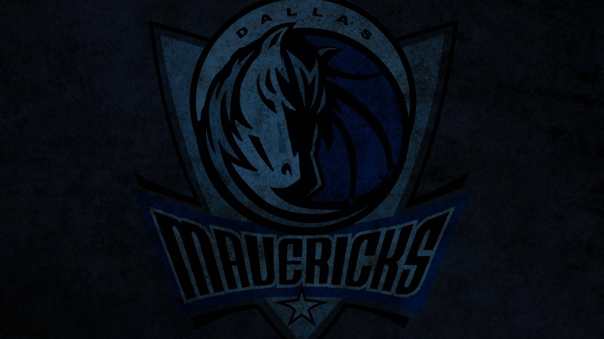 Mavericks 桌布 壁紙 — 達拉斯獨行俠標誌在帶有粗糙復古效果的紋理深色背景上發出深藍色光芒。