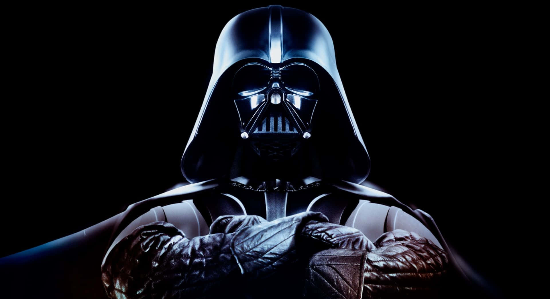 Star Wars Characters 桌布 壁紙 — 達斯維達在黑暗中威嚴地站立，雙眼發光，雙臂交叉，投射出陰森的剪影。