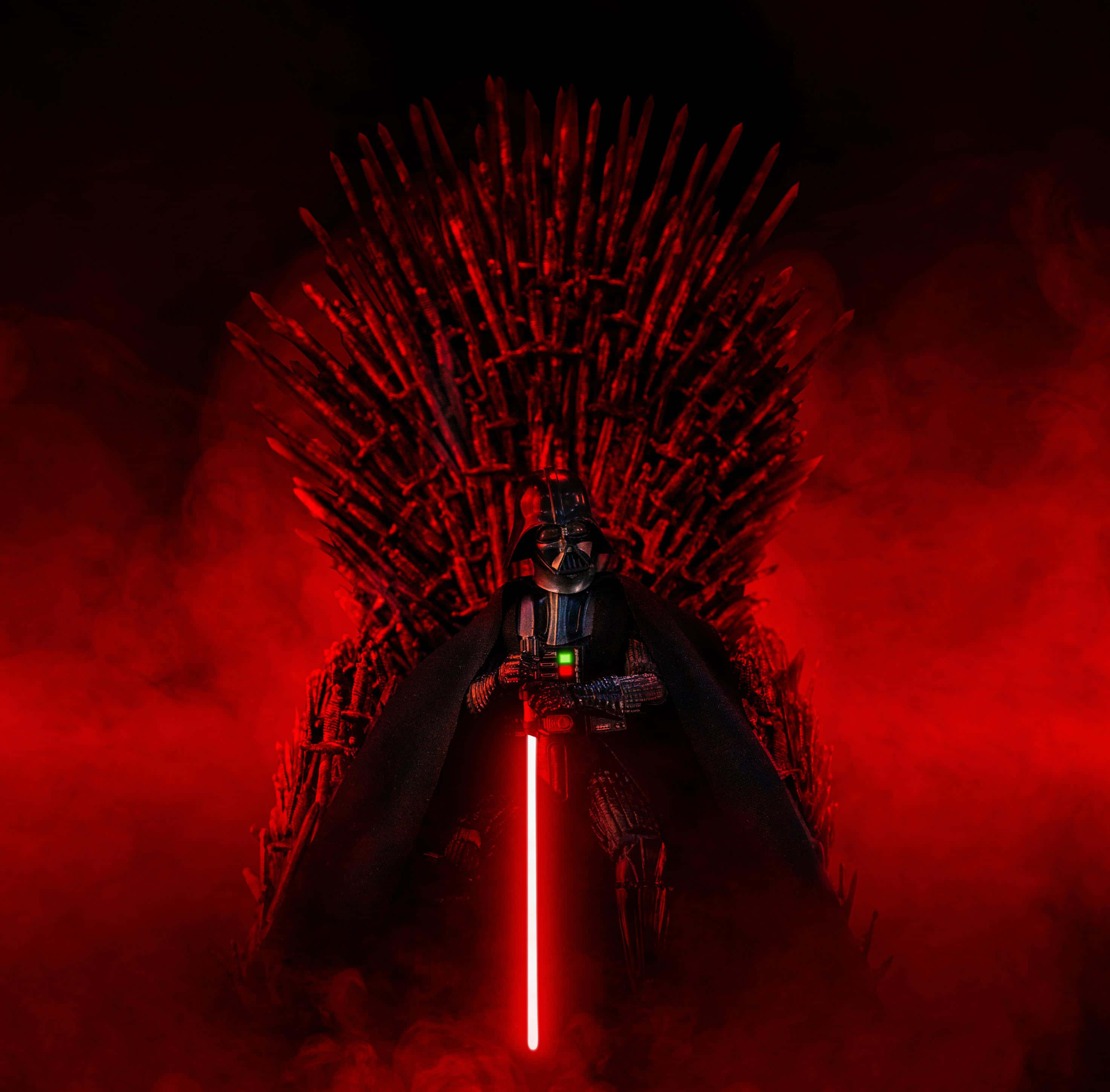 The Chosen One 桌布 壁紙 — 達斯維達坐在鐵王座上，手持紅色光劍，周圍環繞著旋轉的深紅色煙霧。