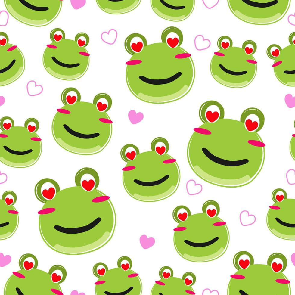 Frog 桌布 壁紙 — 重複圖案，可愛的綠色青蛙，心形眼睛，粉紅臉頰，白色背景，散落粉紅心形。