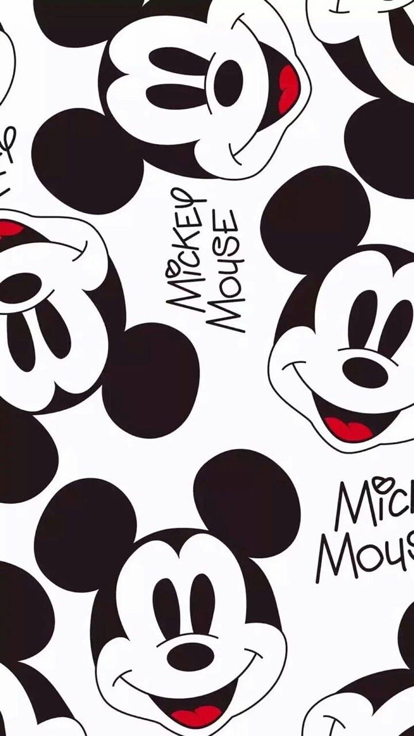 Disney Pattern 桌布 壁紙 — 重複的米奇老鼠面孔，帶有紅唇和黑耳，白色背景上散落著文字。
