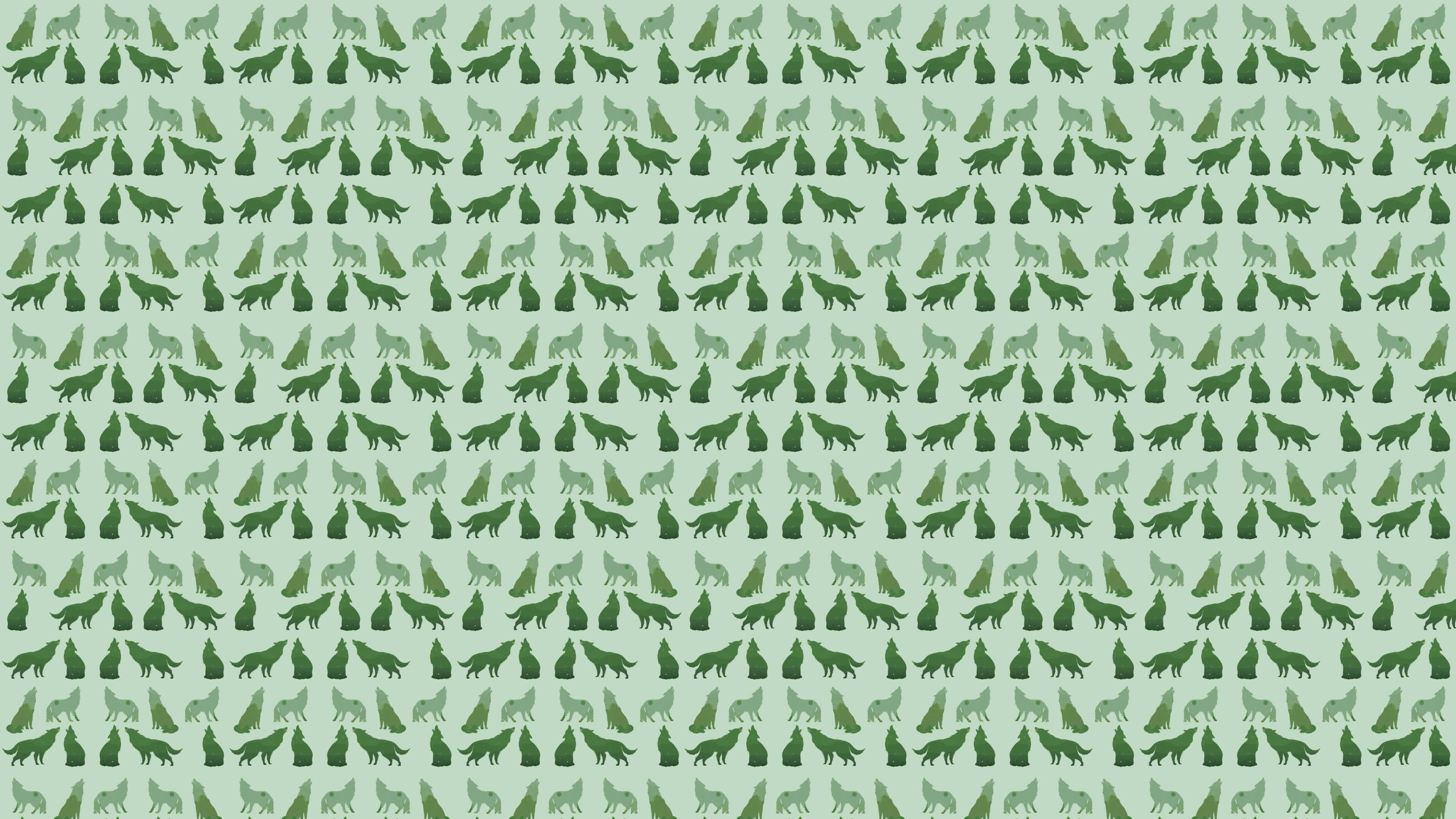 Wolf Pattern 桌布 壁紙 — 重複的綠色狼剪影以各種姿勢在淡薄荷色背景上形成密集圖案。