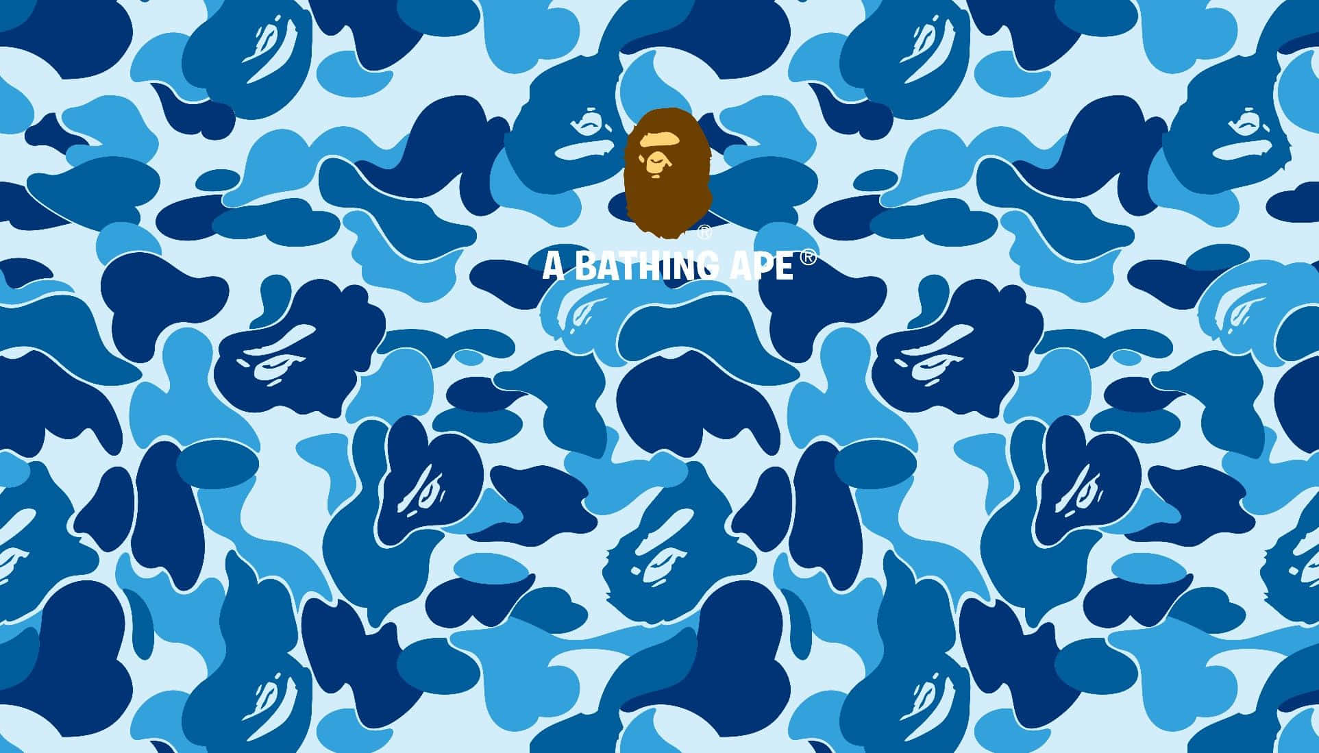 Bape 動態 桌布 壁紙 — 重複的藍色迷彩圖案，帶有風格化的猿臉和居中設計的文字 A BATHING APE。