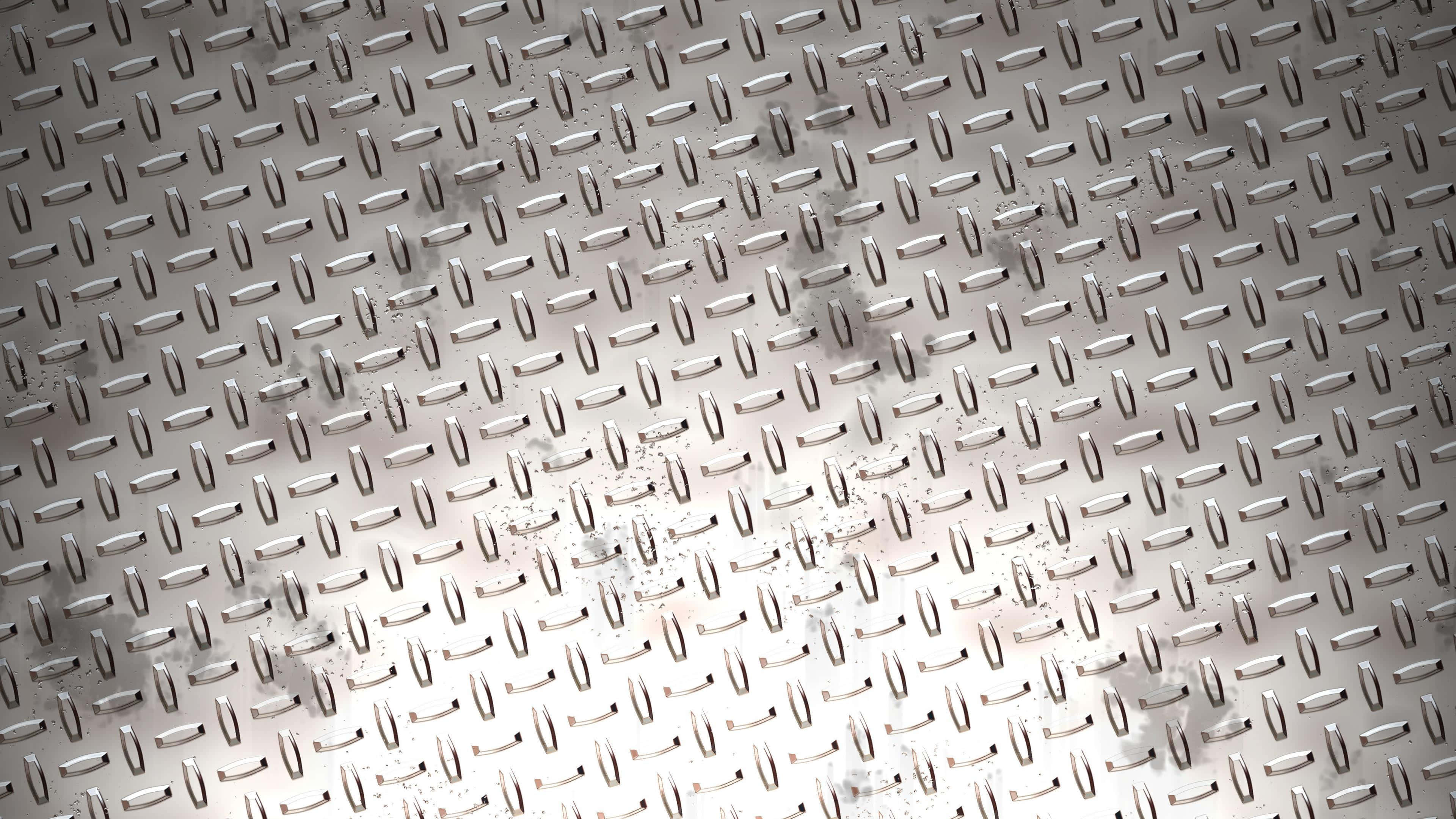 Diamond Plate 桌布 壁紙 — 金屬菱形板表面特寫，在明亮光線下帶有散落的鏽蝕和磨損。