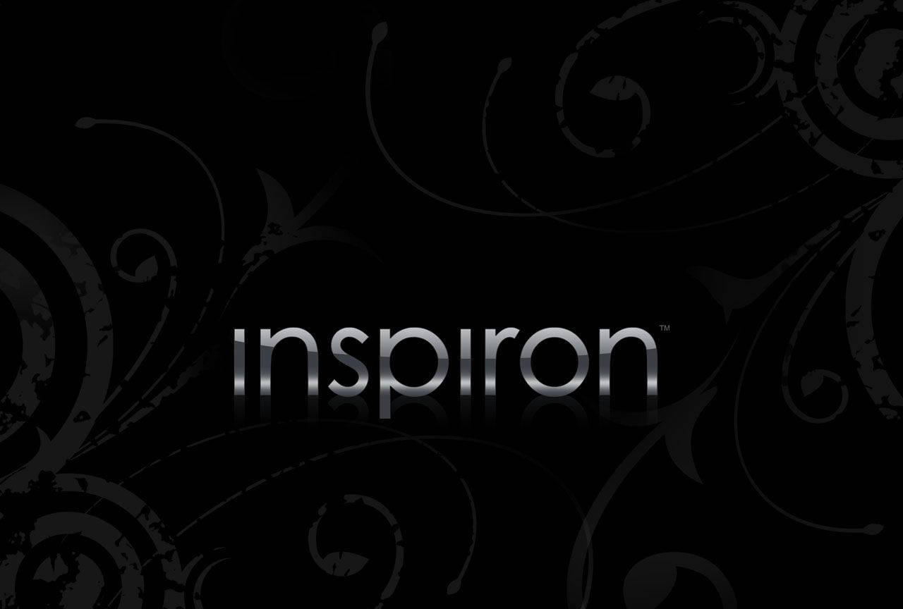 Dell 桌布 壁紙 — 金屬銀色文字 'inspiron' 帶有倒影，居中位於黑色背景上，背景點綴著微妙的灰色漩渦圖案。