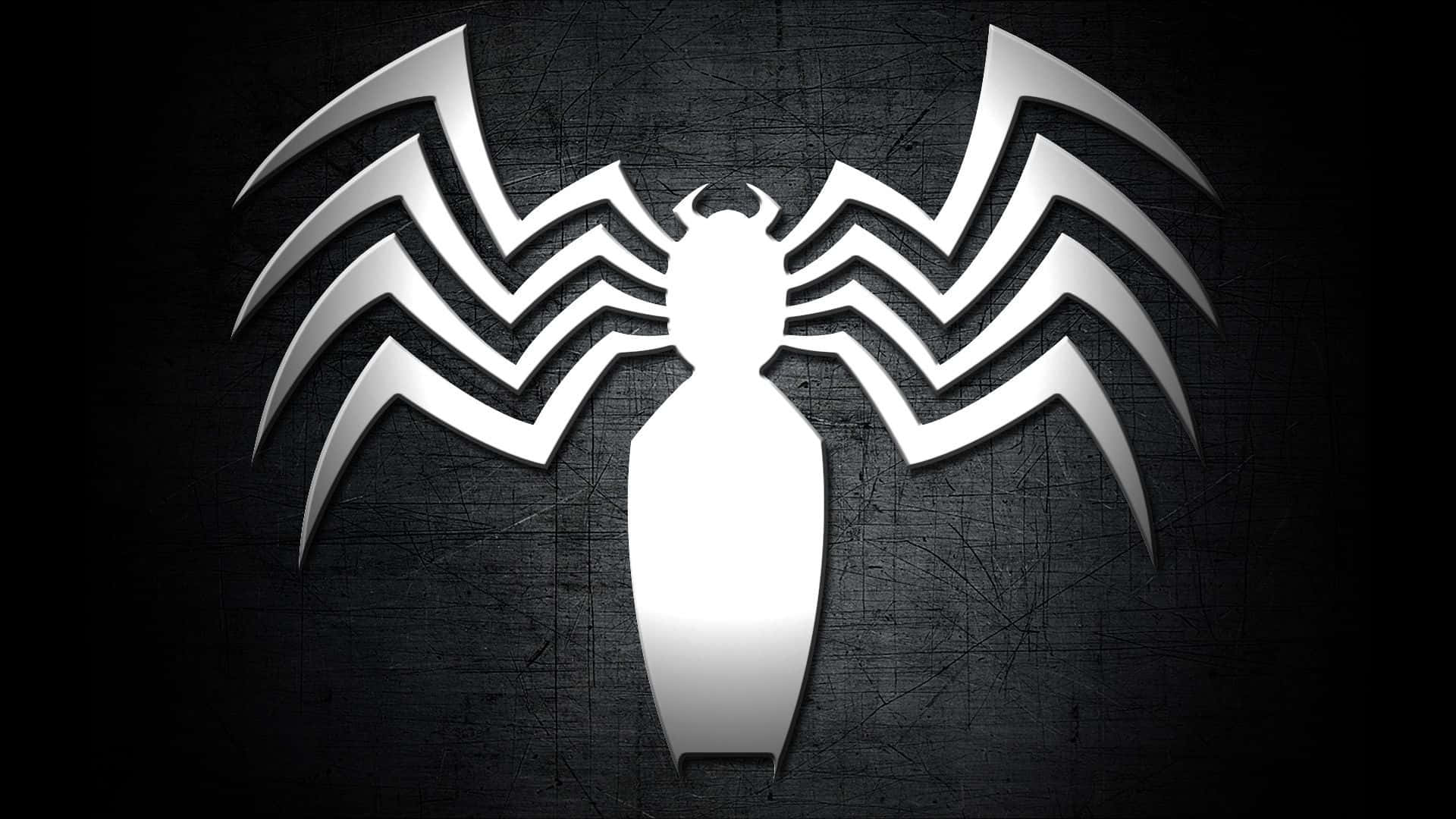 Venom Carnage 桌布 壁紙 — 金屬銀色的Venom標誌在刮花的深灰色牆上發光，帶有戲劇性的燈光效果。